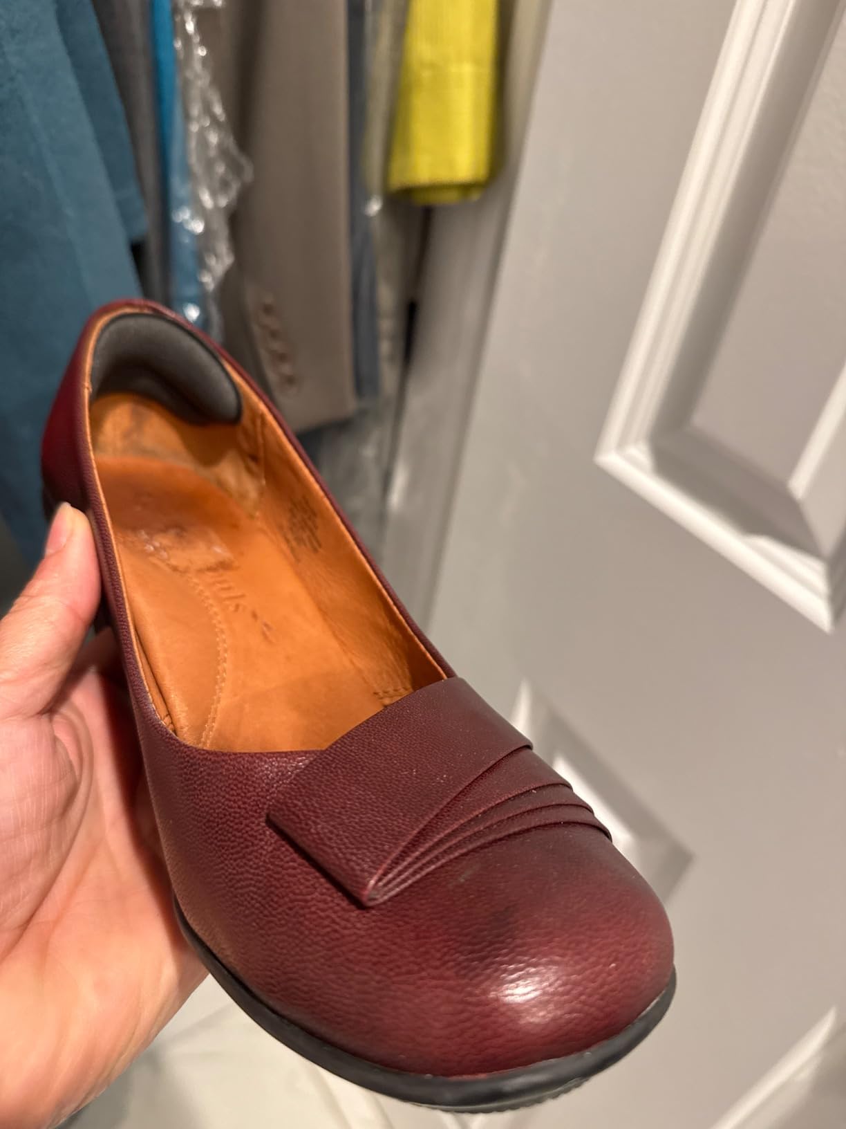 Heel pads in use showing how they prevent foot slipping in oversized shoes