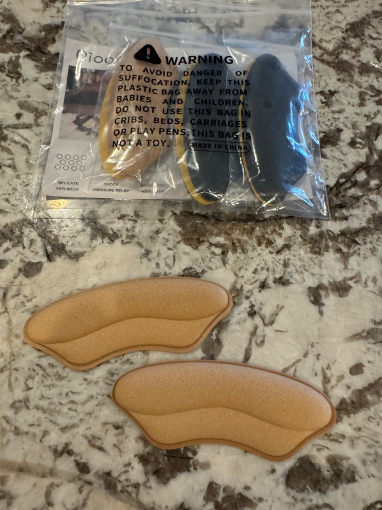 Heel pads used in dress shoes for evening wear showing comfort and stability
