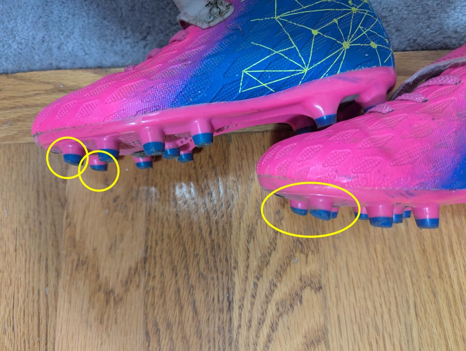 brooman kids soccer cleats showing wear after one month of use on front cleat area