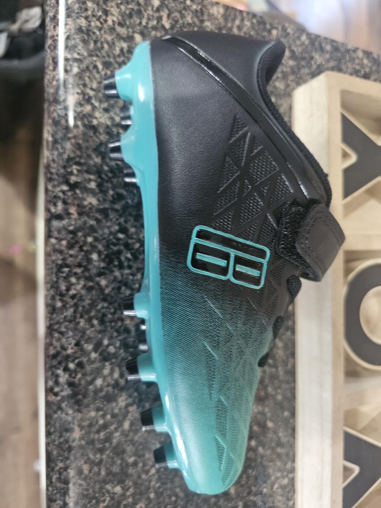 brooman soccer cleats tested on different field surfaces showing wear patterns