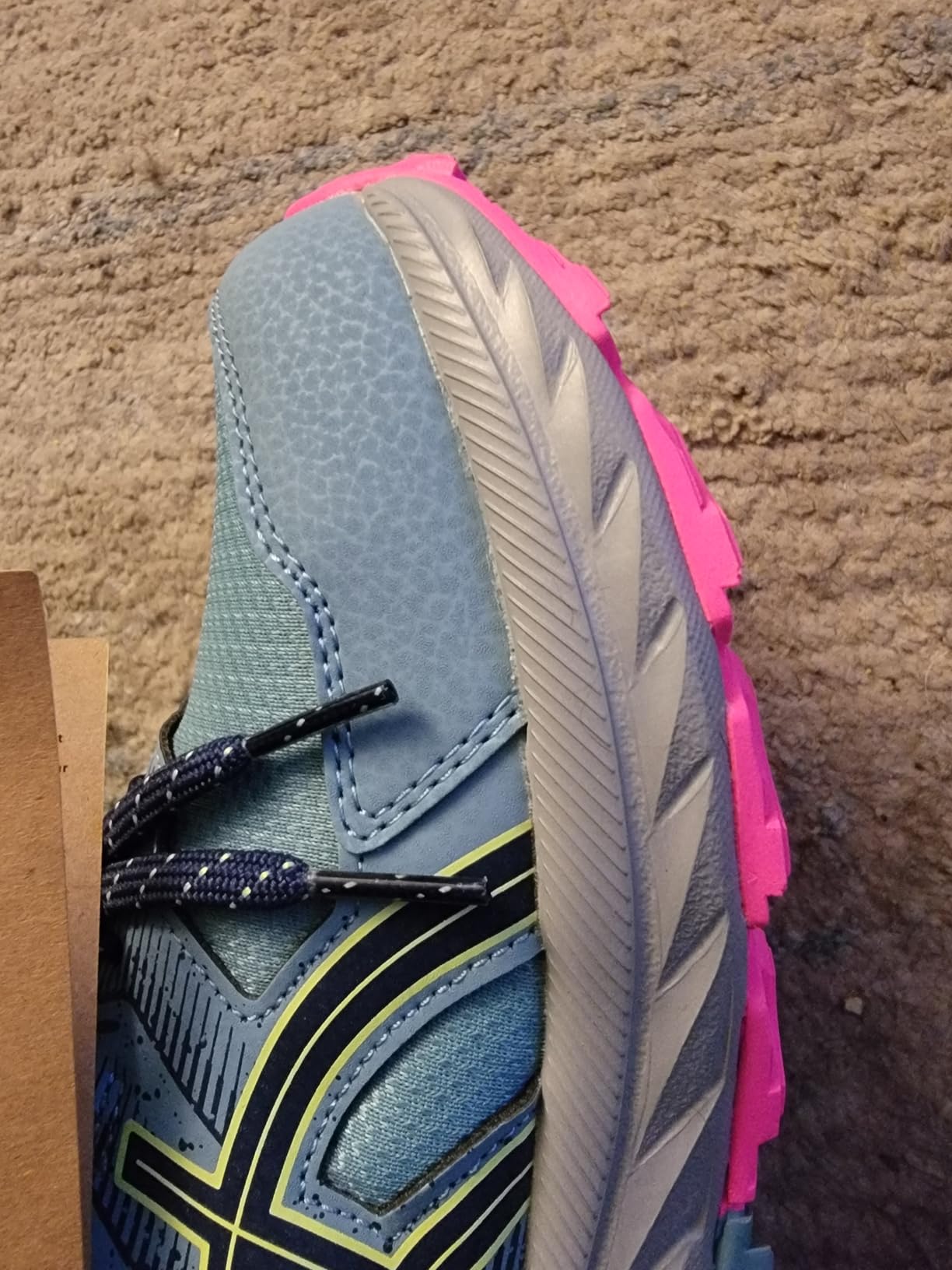 ASICS Gel-Venture 9 side profile showing AMPLIFOAM midsole and trail outsole pattern