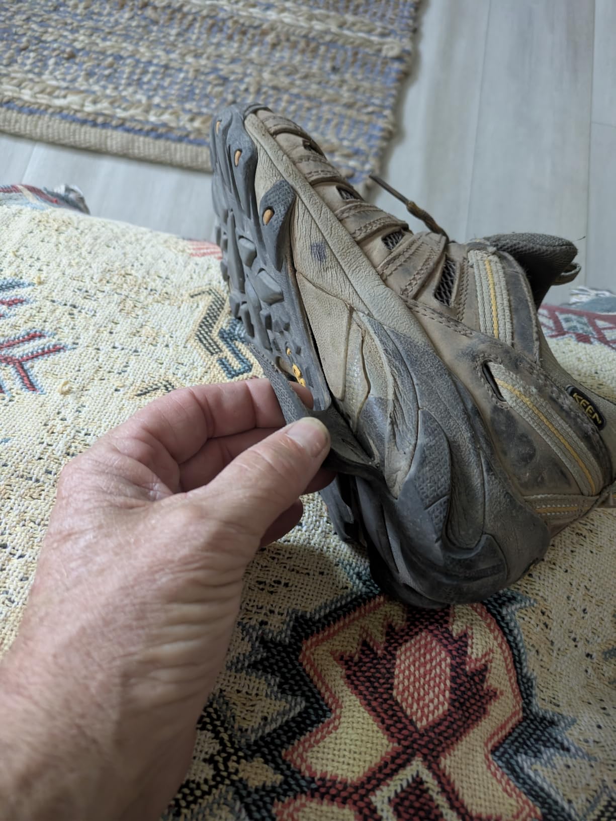 Example of sole delamination issue showing rubber outsole separating from midsole