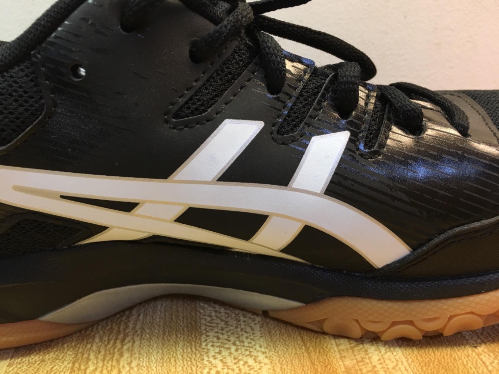 ASICS Gel-Rocket 9 in action during volleyball play showing lateral movement stability