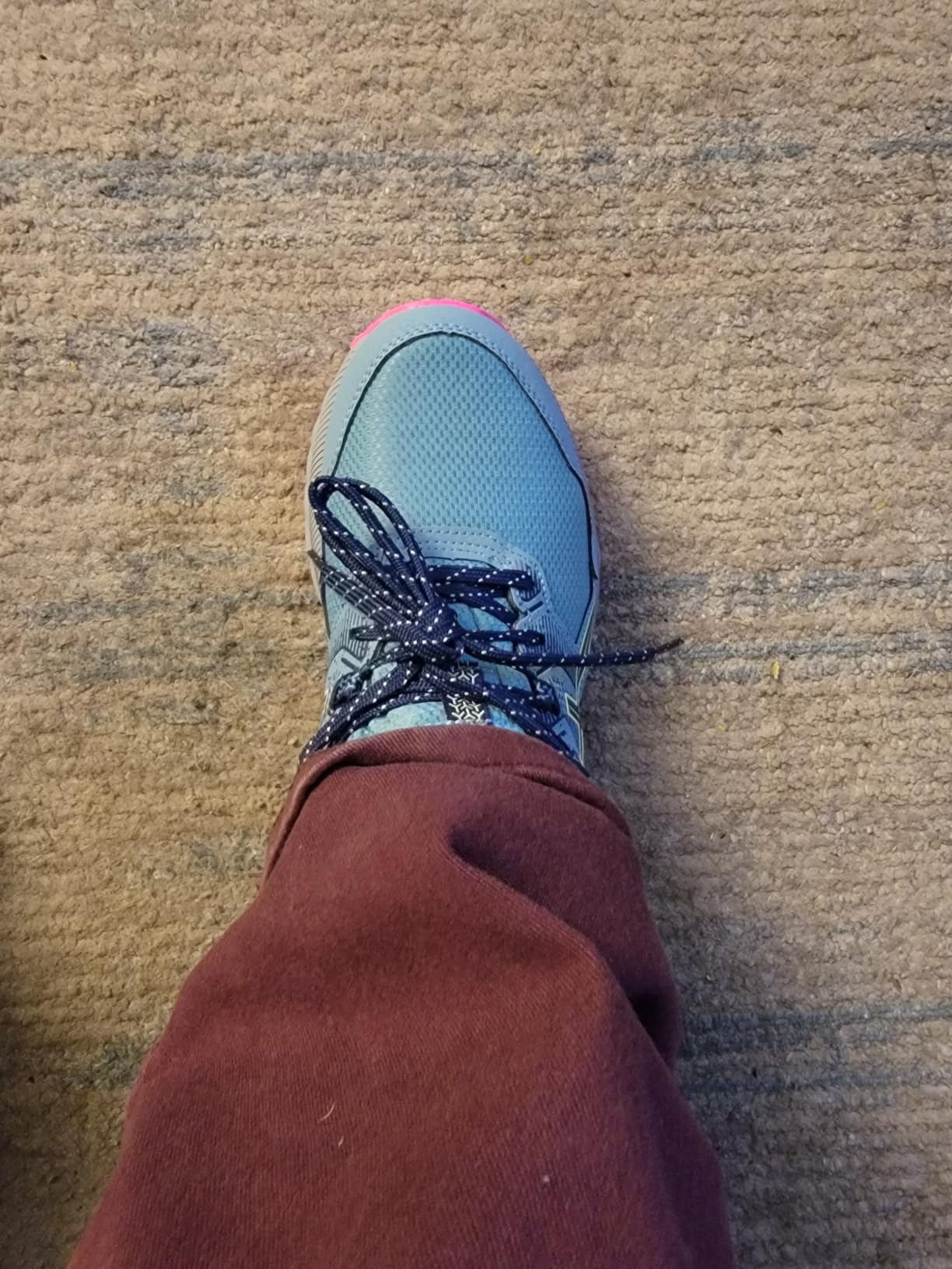 Close-up of ASICS Gel-Venture 9 upper mesh construction and lacing system