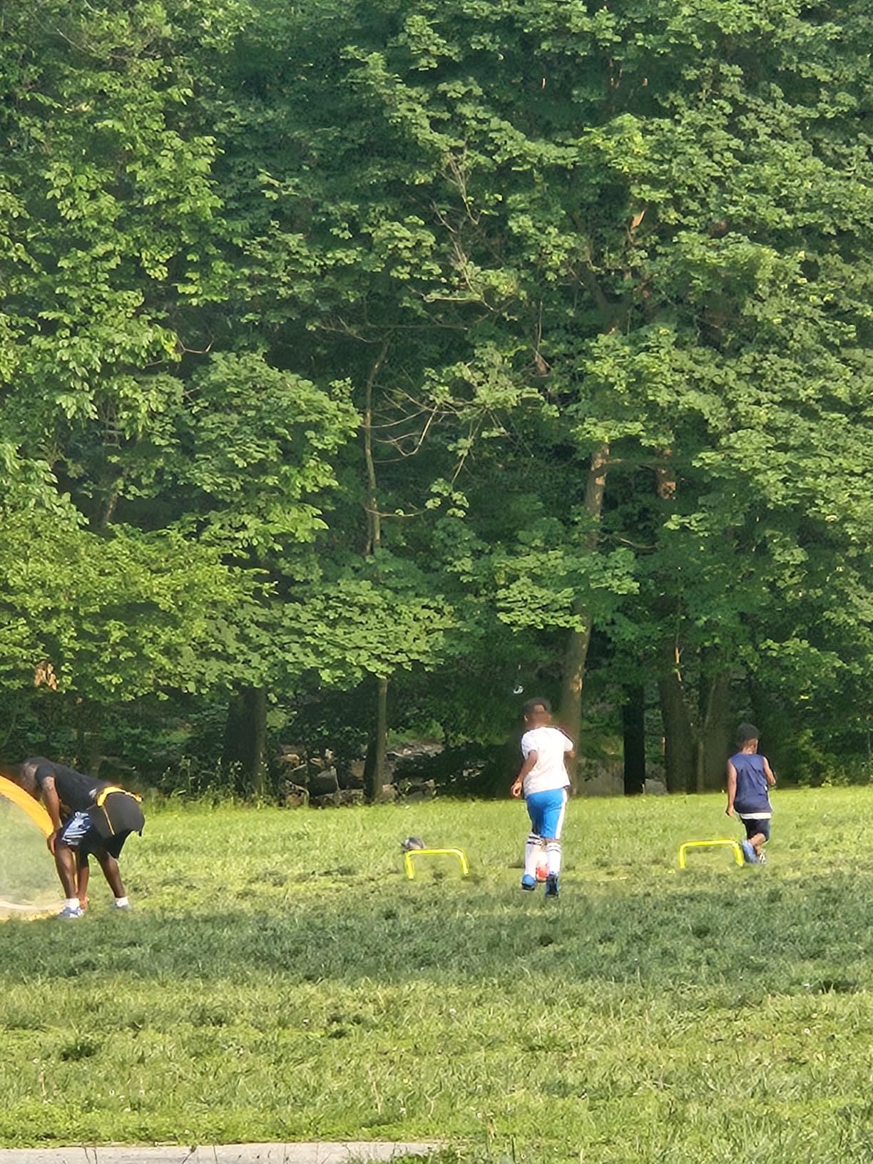 brooman kids soccer cleats in action during field testing showing ground grip