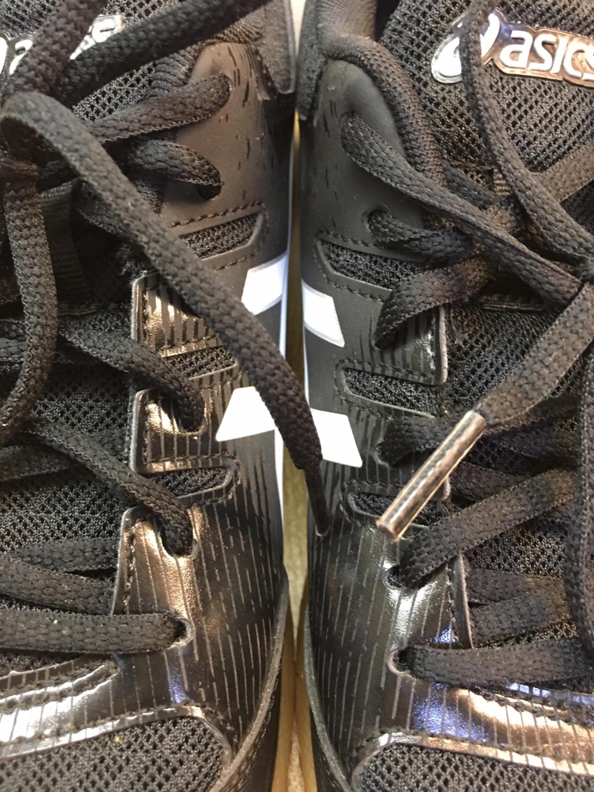 ASICS Gel-Rocket 9 court performance showing shoe during dynamic movement on indoor court