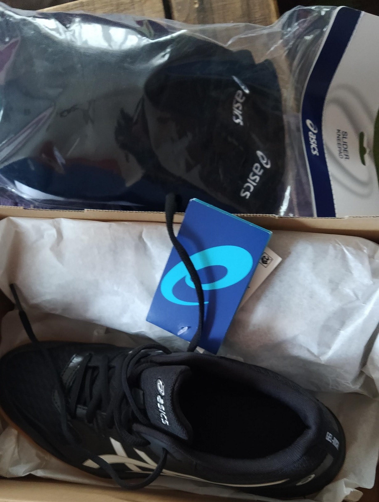 ASICS Women's Gel-Rocket 9 final product shot showing complete shoe design and construction details