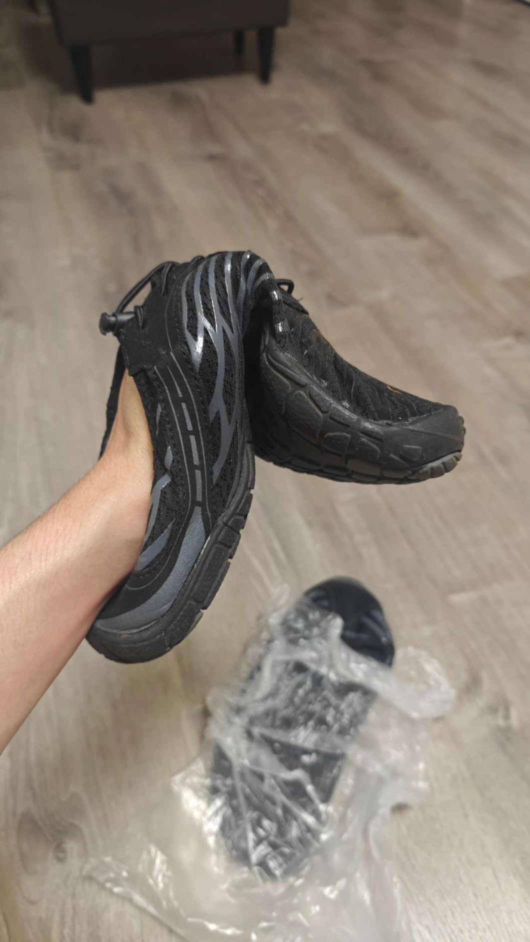 Close-up view of Hike Barefoot Shoes showing mesh upper construction and flexible rubber sole design