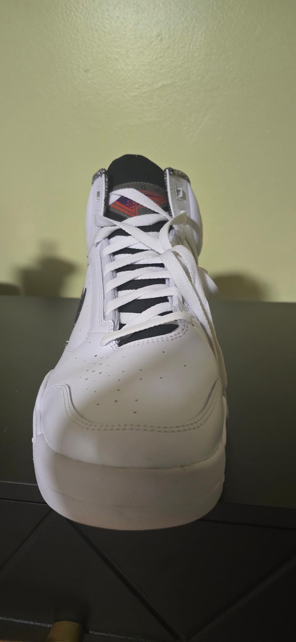 Detail shot of the heel and ankle collar of the Nike Air Flight Mid, showing the classic design.