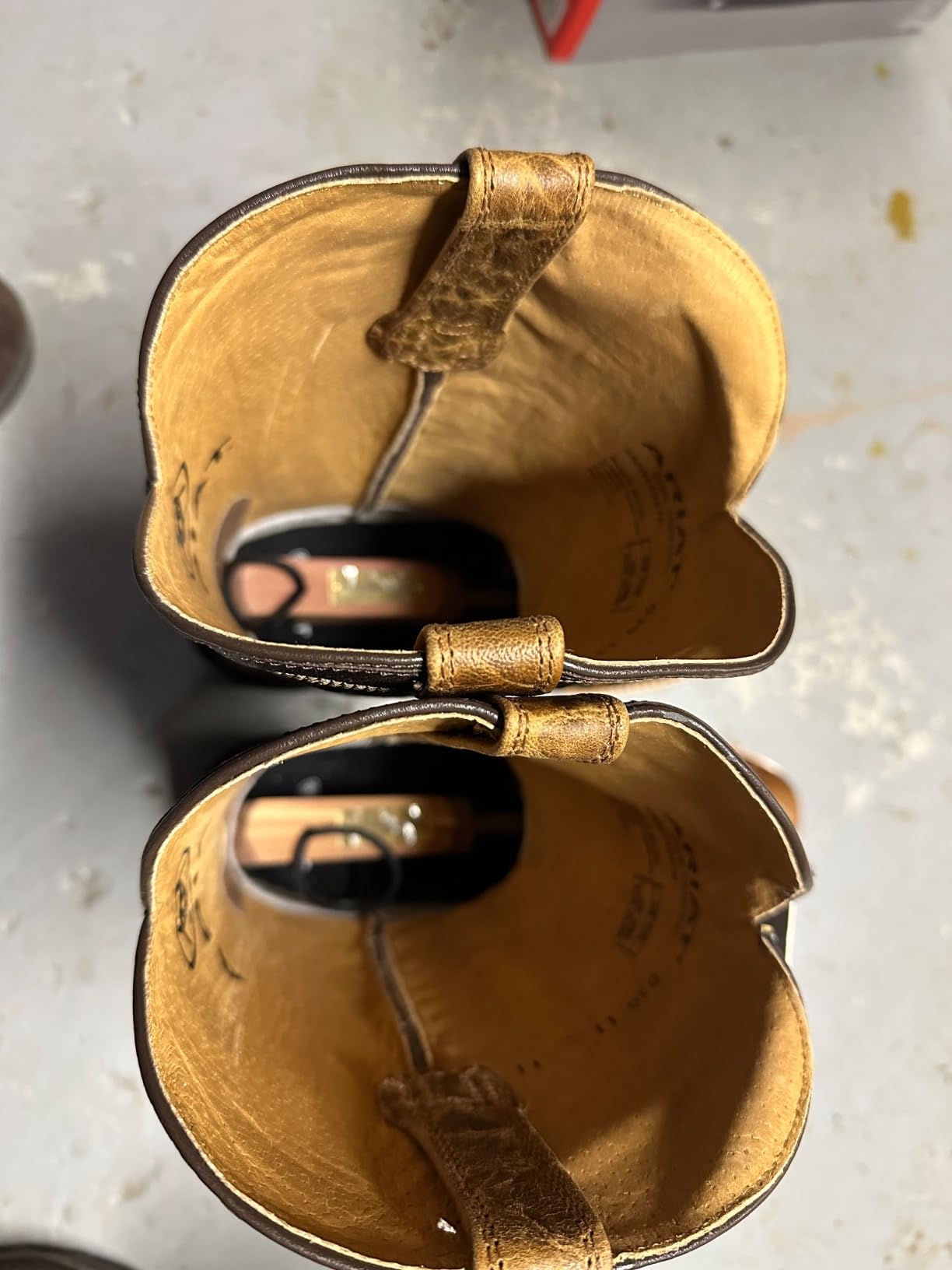 FootFitter cedar shoe trees showing split toe design and fabric loop in men's dress shoes