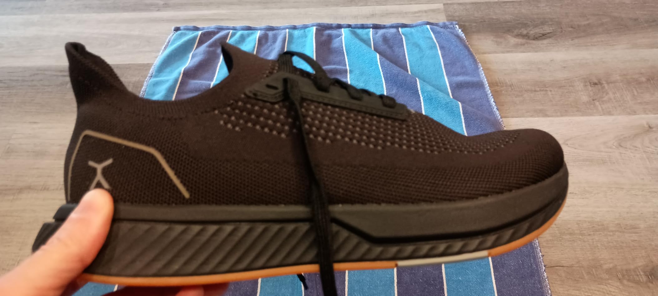 FLUX Adapt Runners in action showing flexibility and ground contact during walking