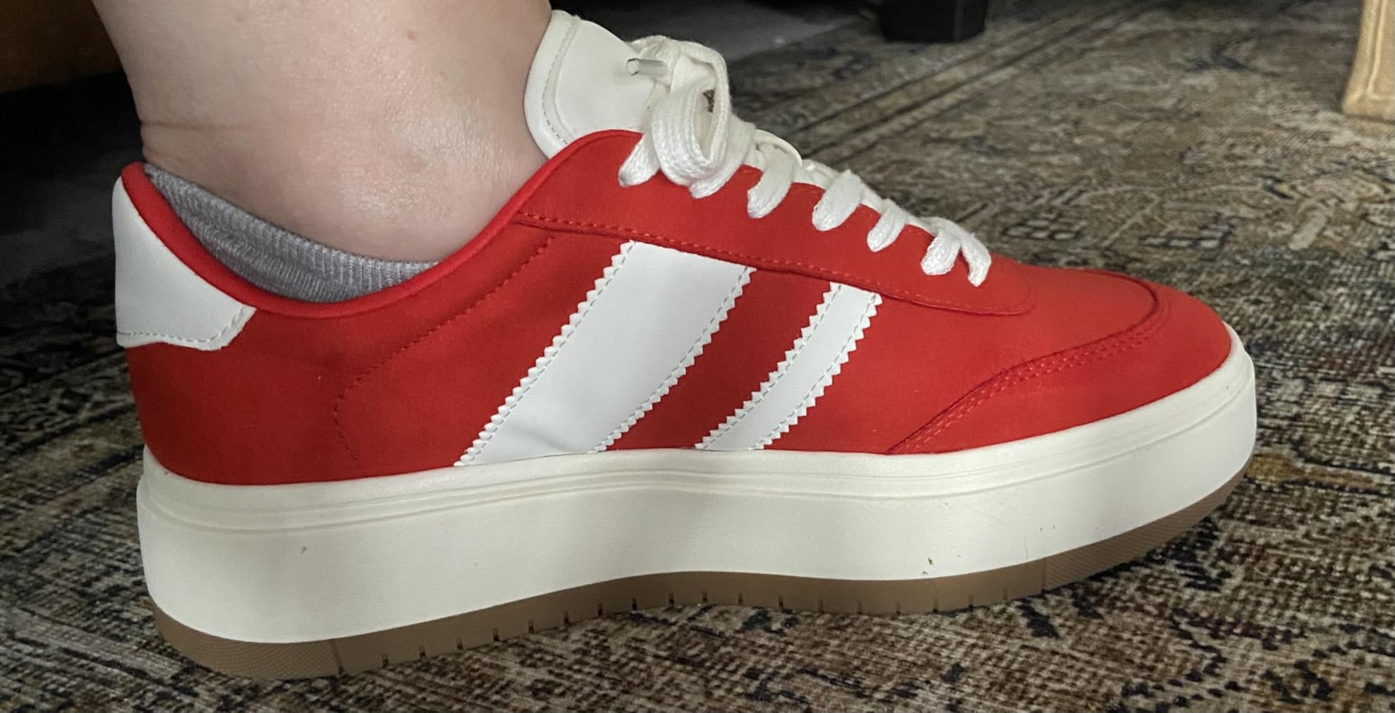 Close-up detail of Project Cloud sneaker construction showing suede-like material and platform design