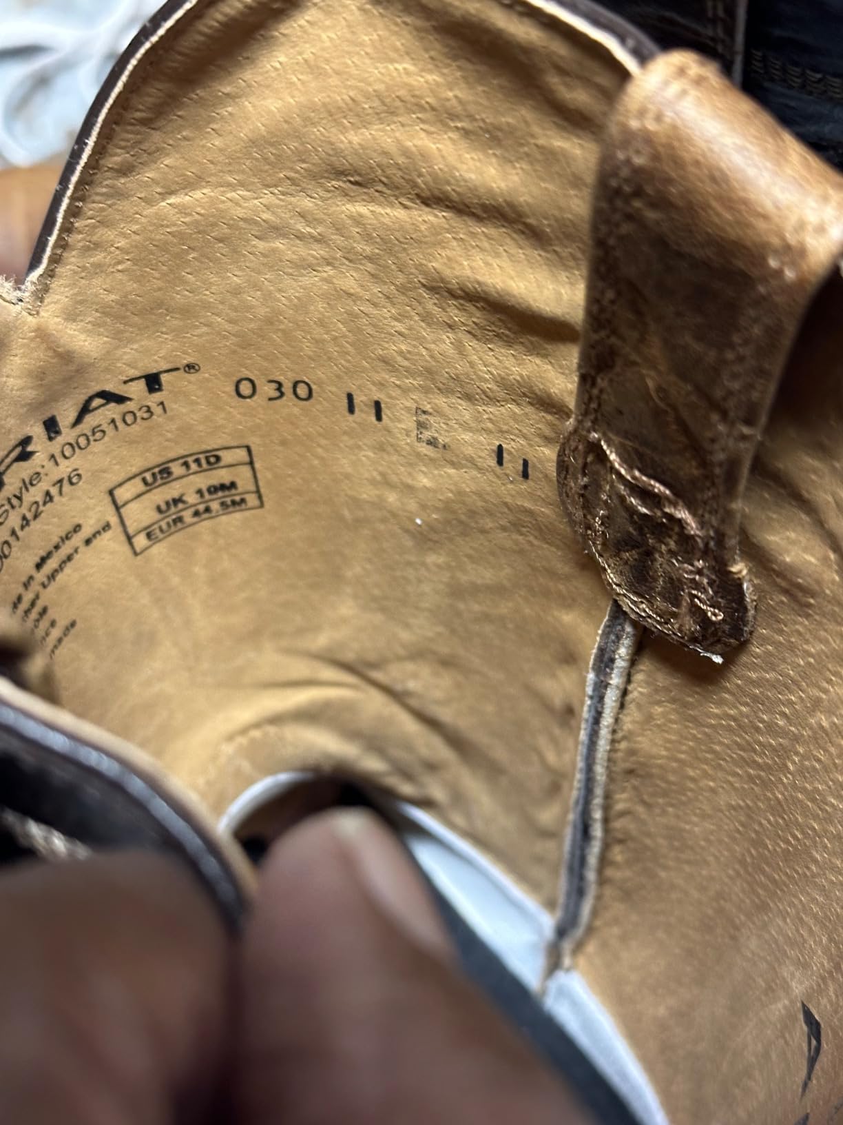 FootFitter cedar shoe trees in various types of men's footwear showing versatility across dress shoes and boots