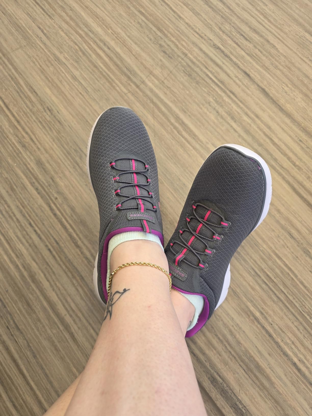 Skechers Summits sneaker detail showing gray and purple colorway and mesh construction