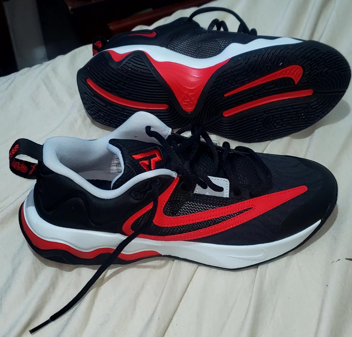 Nike basketball shoes in action showing court performance and traction pattern