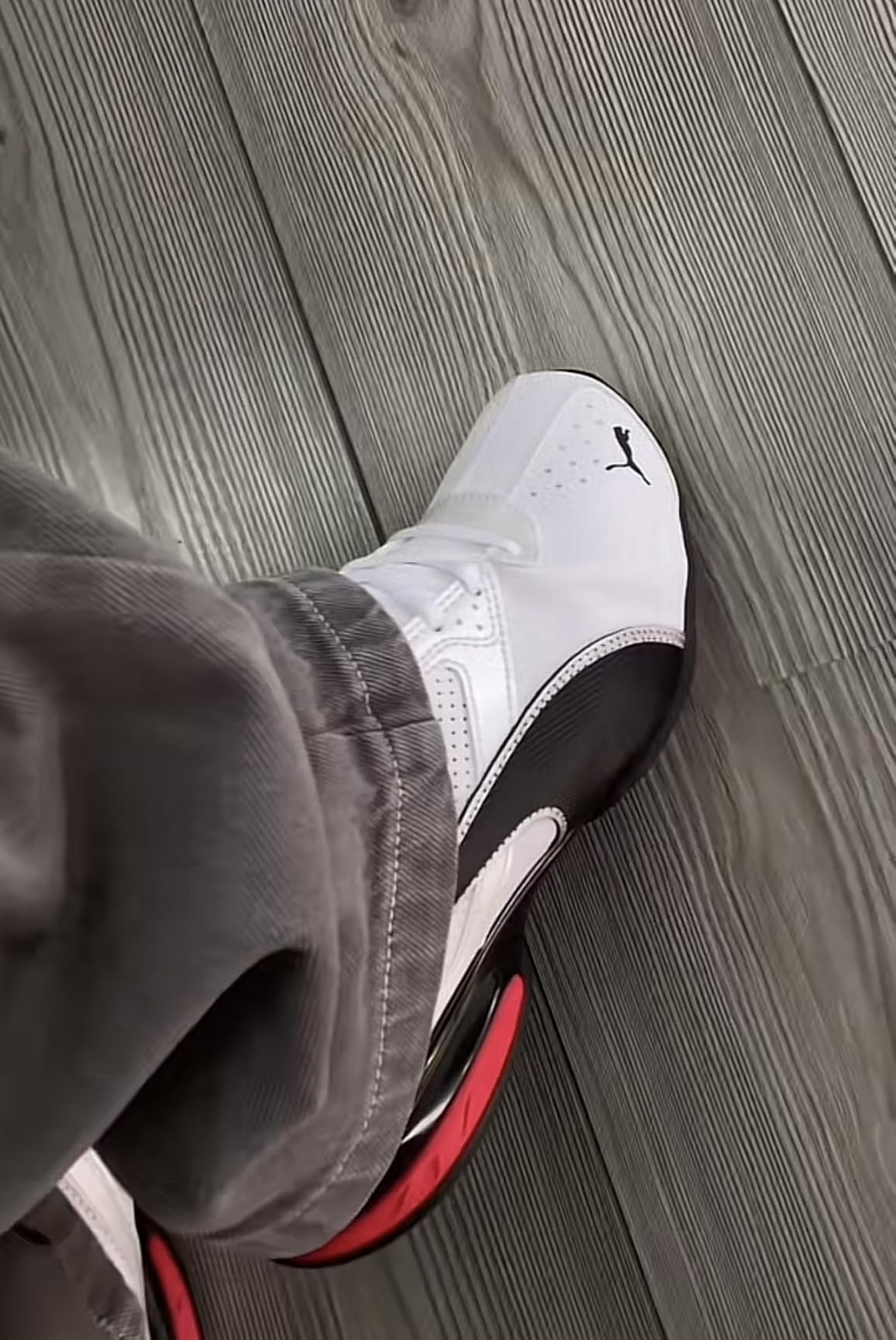 PUMA Tazon 6 heel detail showing EVA cushioning and impact absorption design