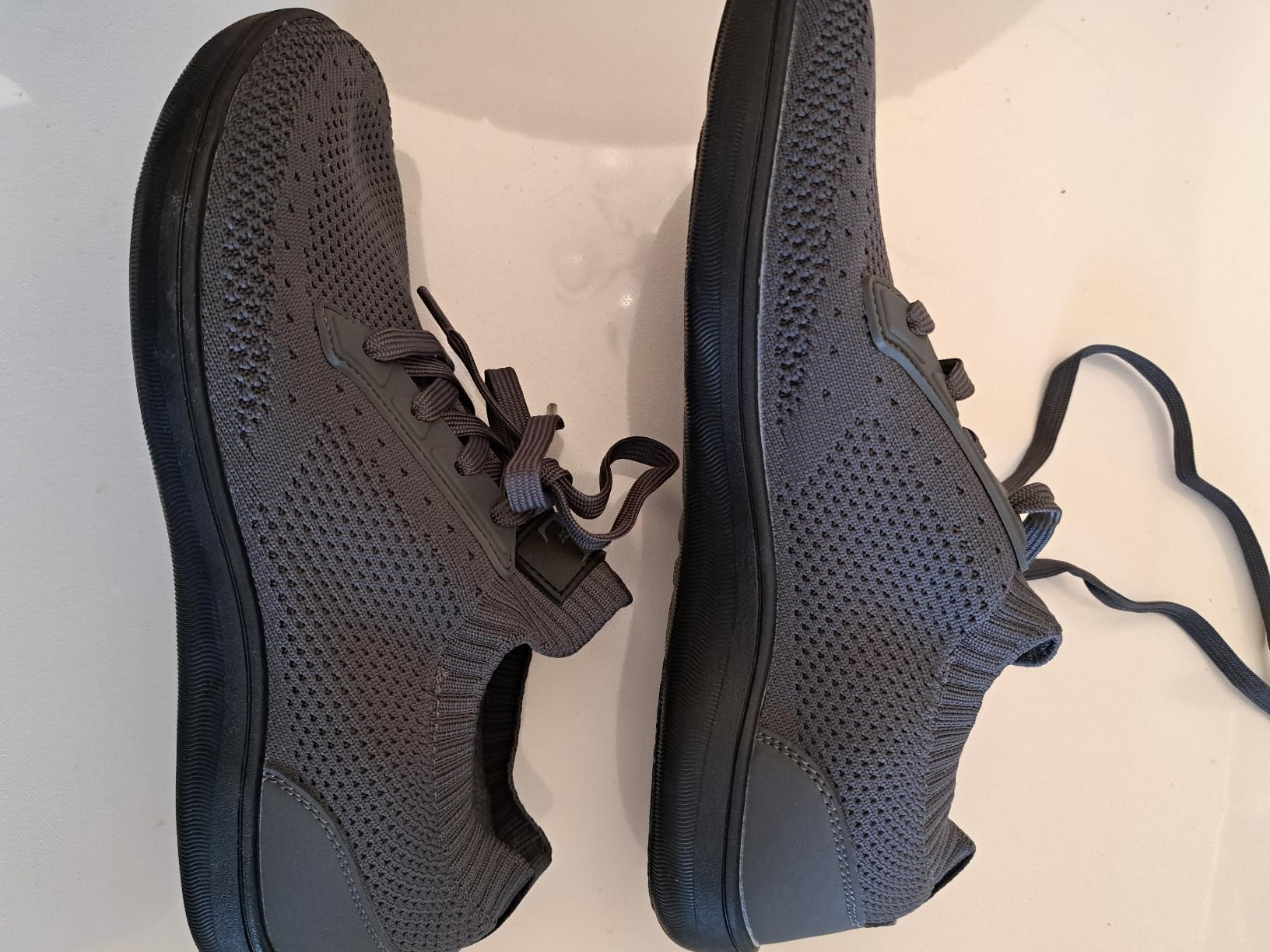 L-RUN shoes being worn in office setting showing versatility and professional appearance