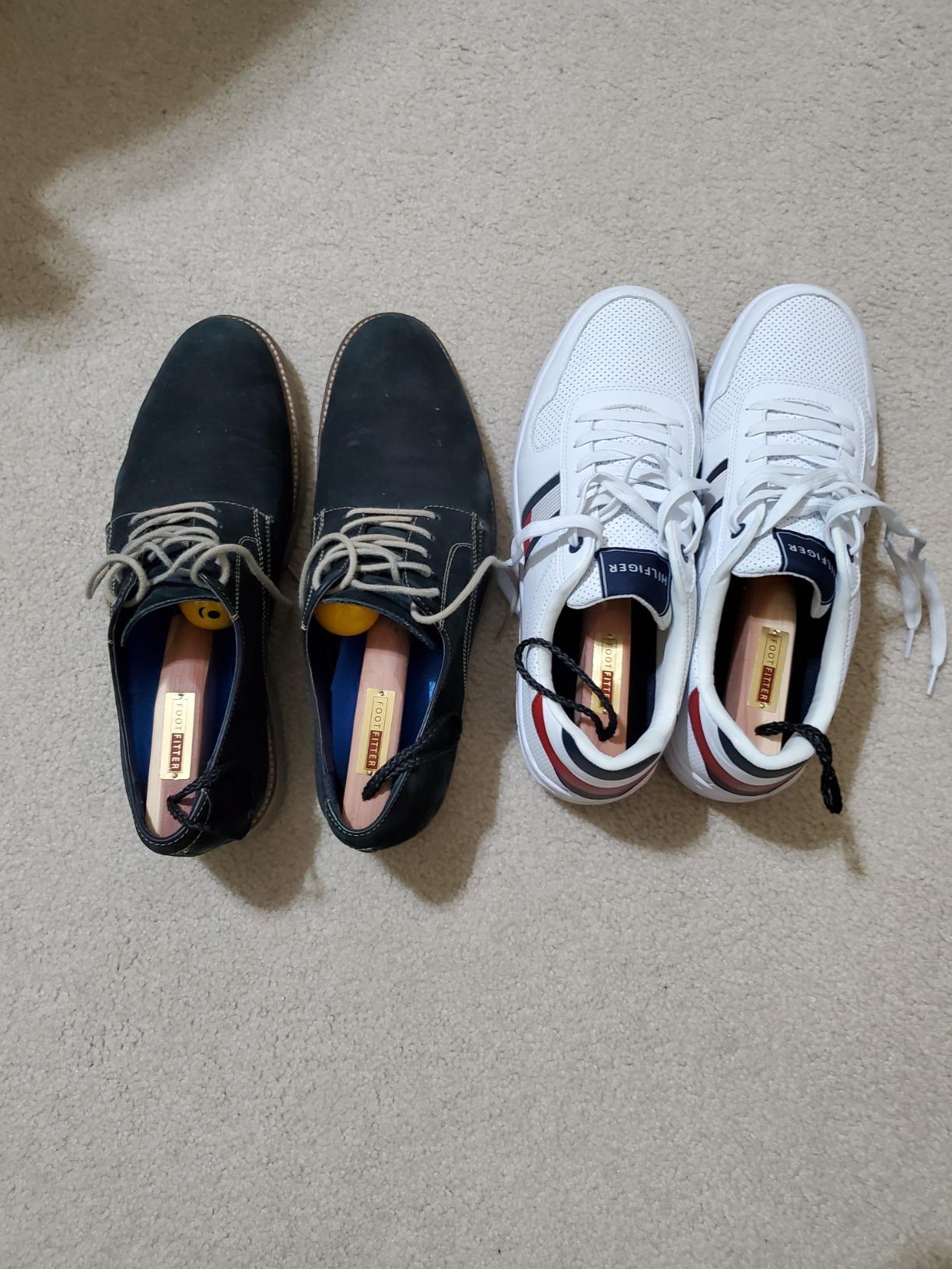 Close-up of FootFitter cedar shoe tree showing split toe construction and fabric loop detail