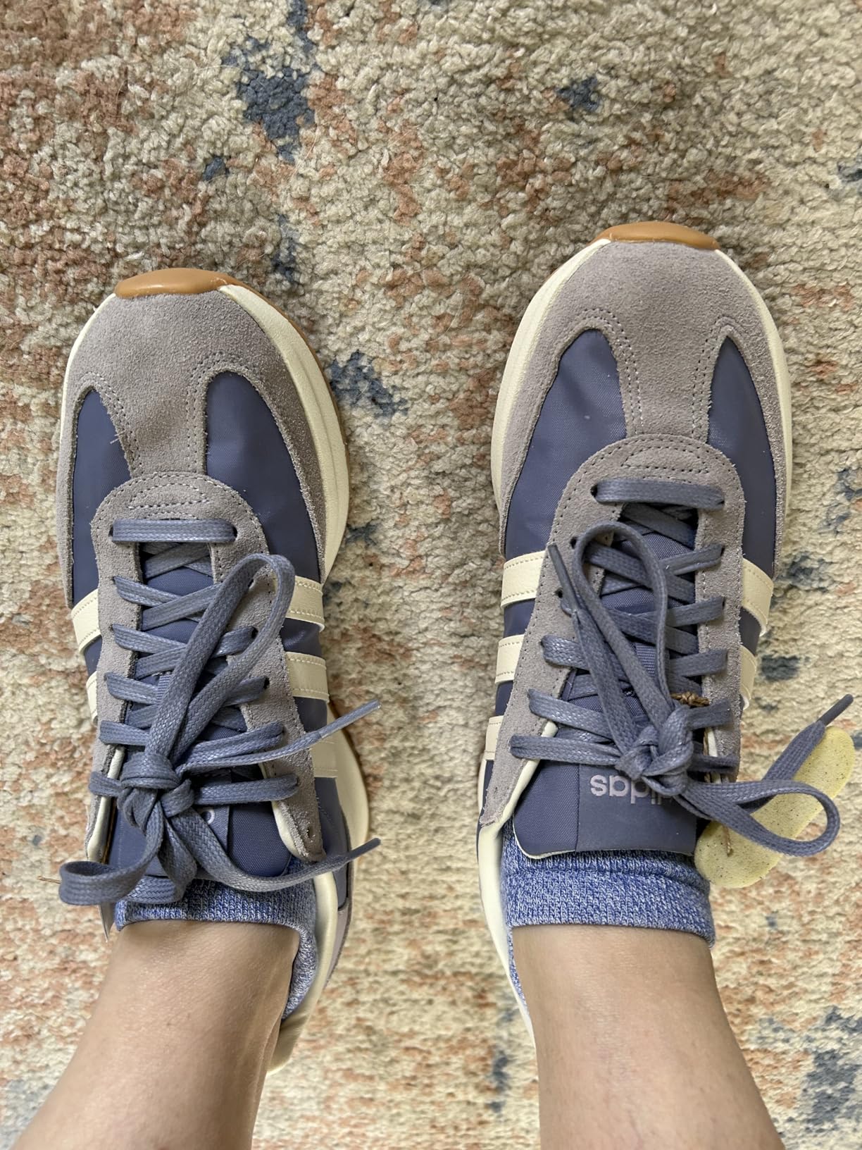 Adidas Run 72 lifestyle wear showing versatility with casual outfits