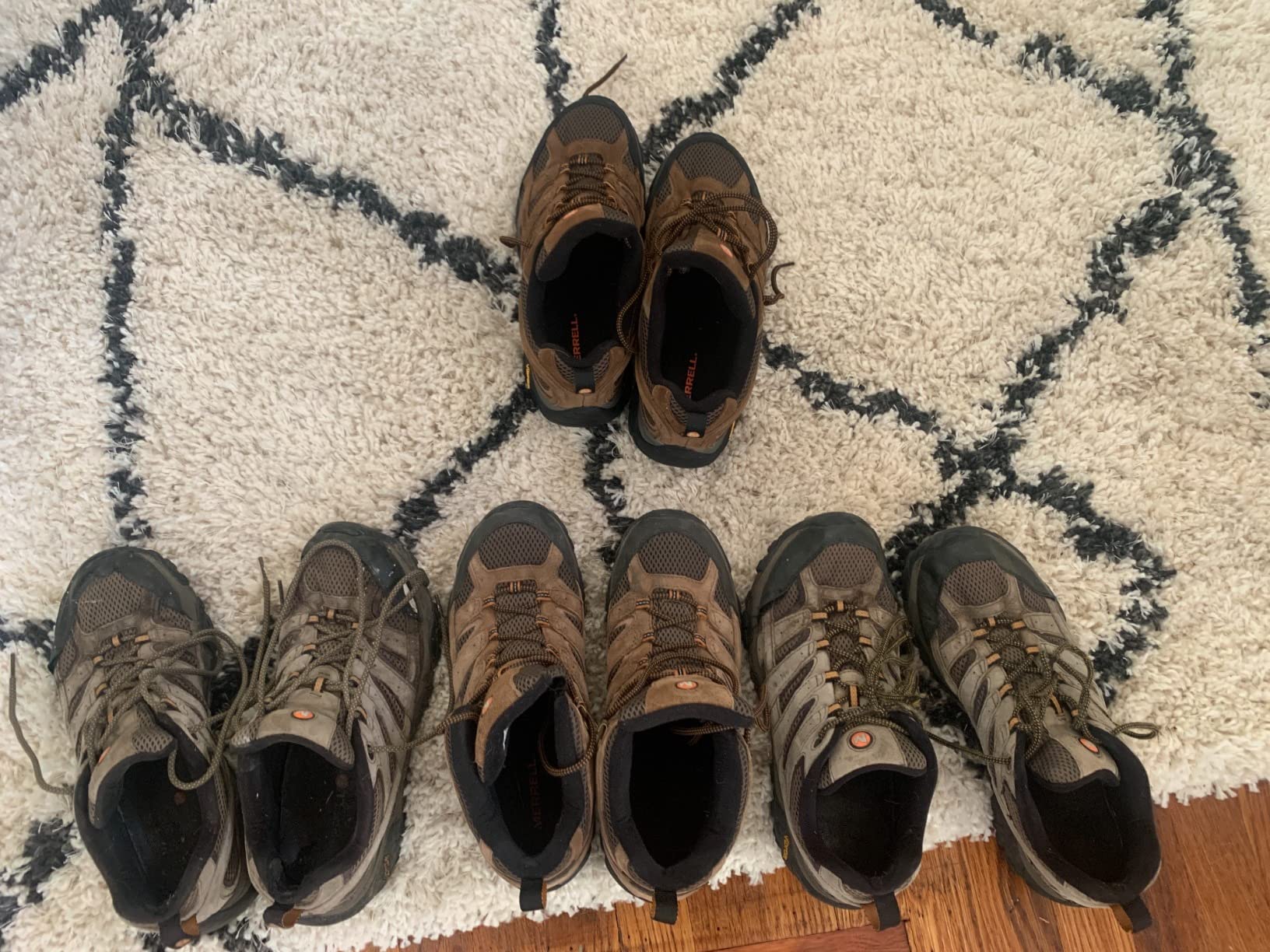 Merrell Moab 2 Vent hiking shoes on rocky trail showing Vibram outsole grip performance