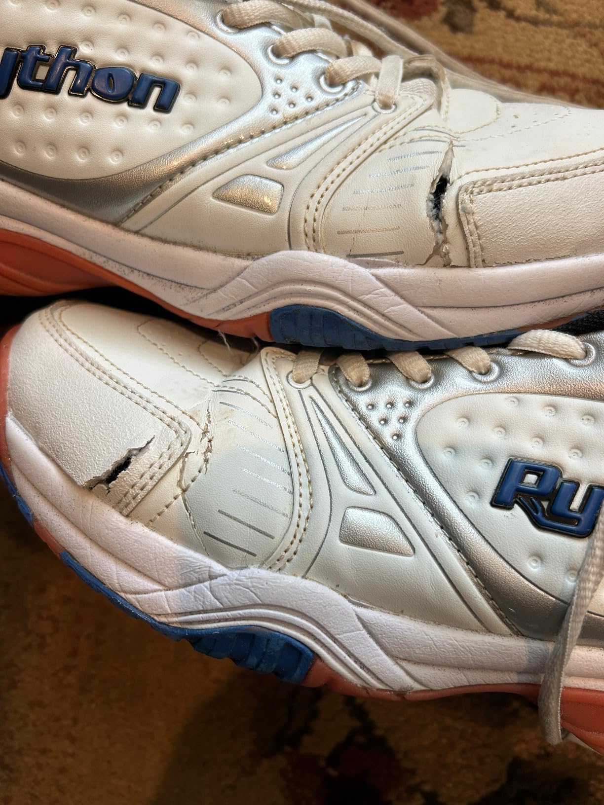 Python court shoes showing edge wear and stress points after intensive court use