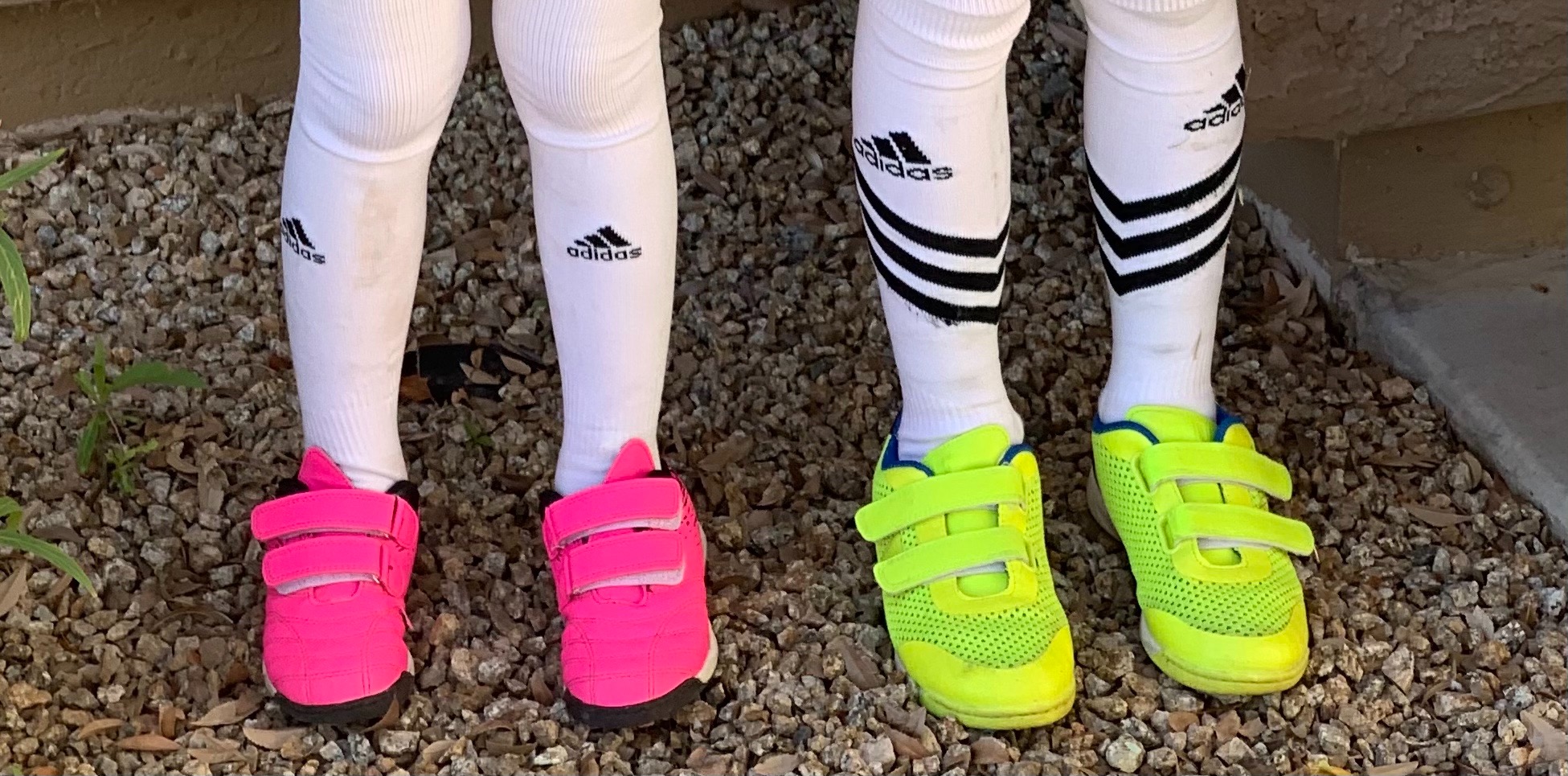 brooman soccer shoes on turf field showing sole pattern and grip during youth soccer action