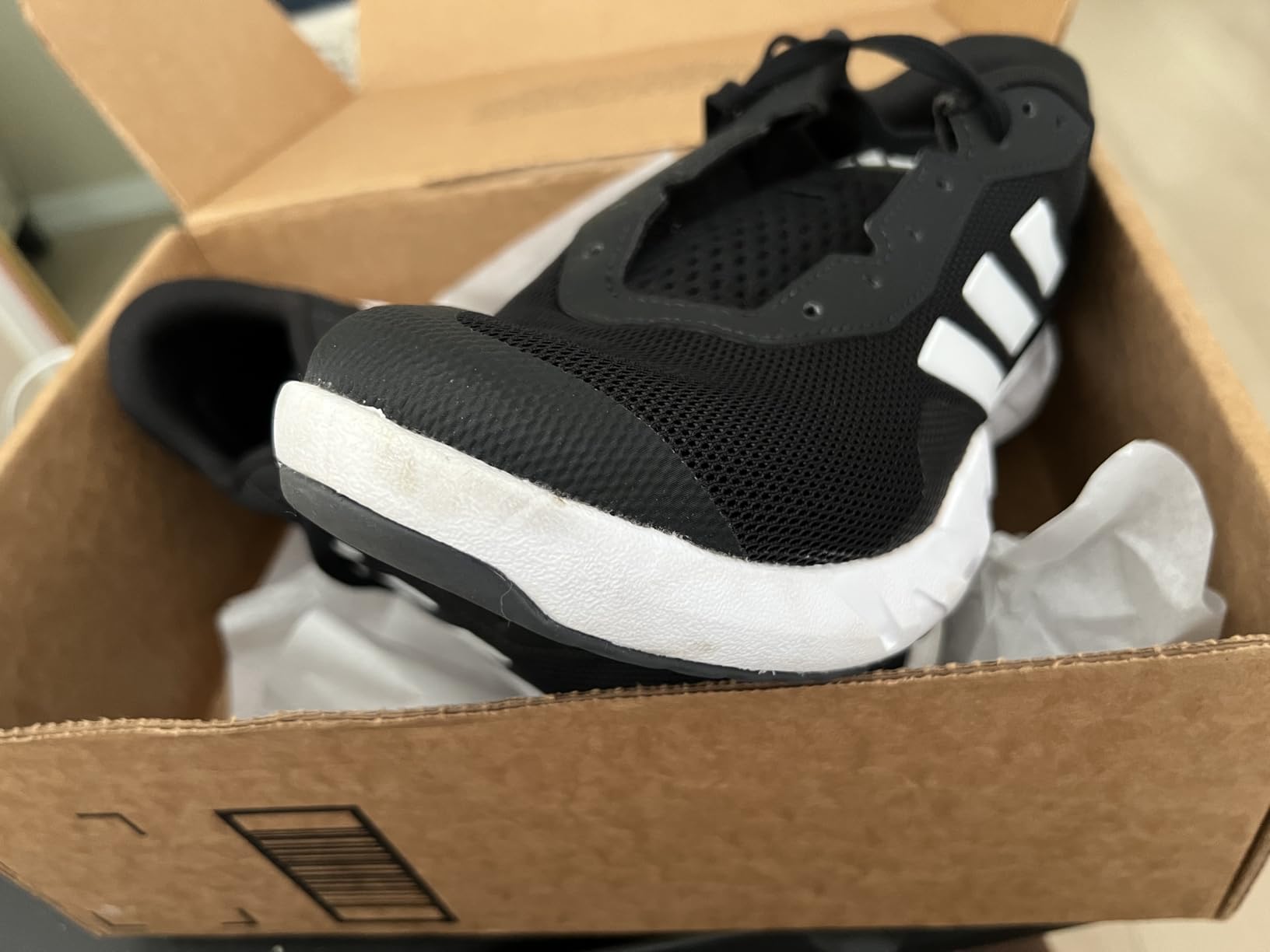 Adidas Amplimove training shoes showing wear patterns after extended gym use