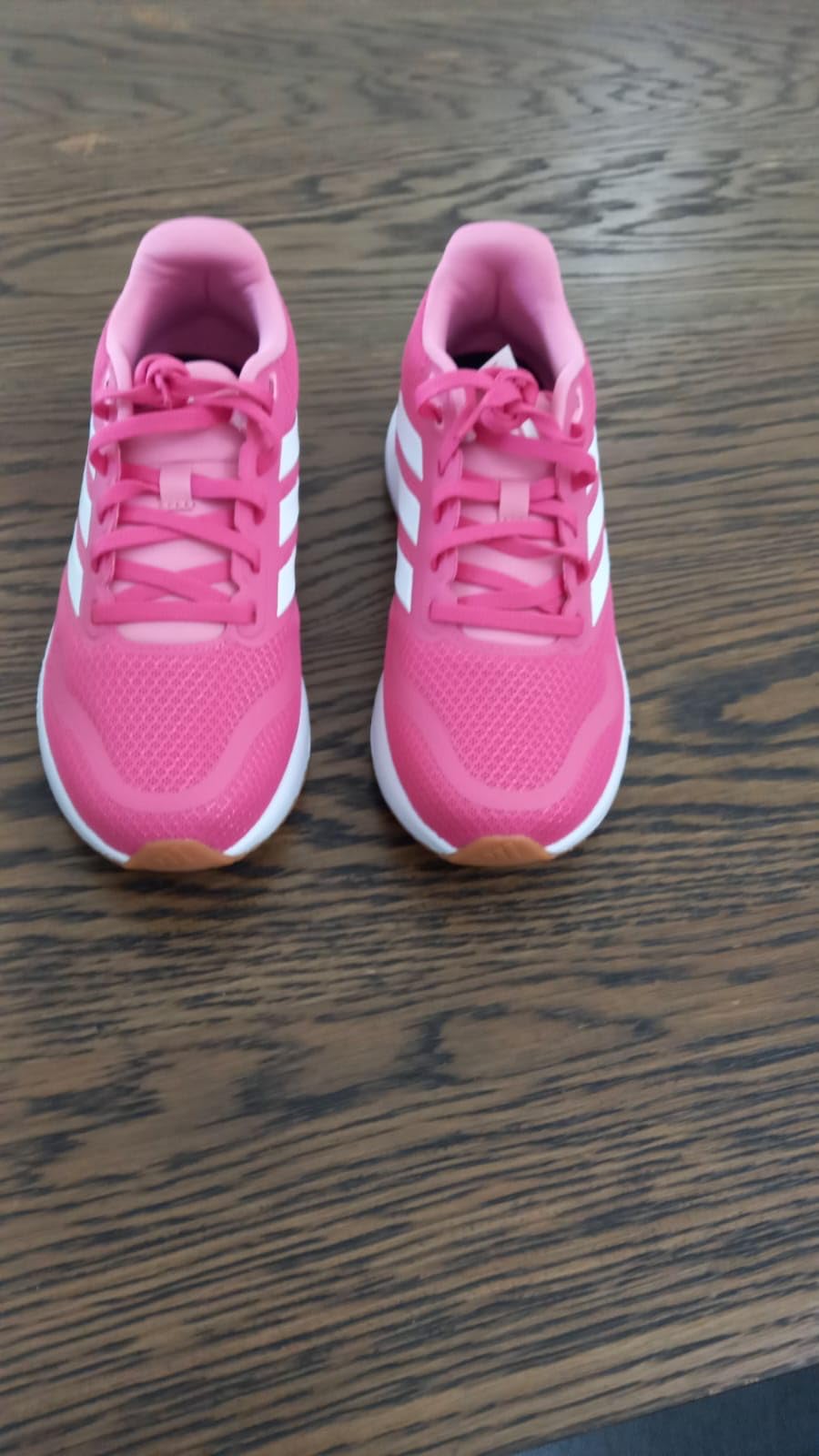 Adidas Run Falcon 5 showing hook and loop closure system for easy on and off