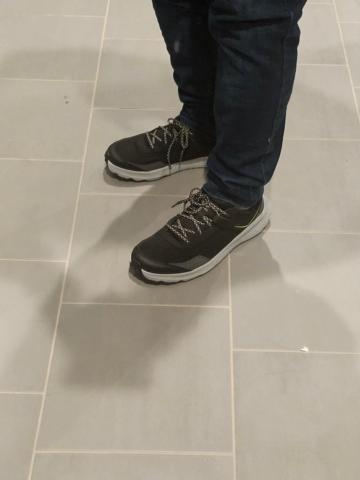 Columbia Vertisol trail shoe shown on rocky terrain demonstrating real-world trail performance