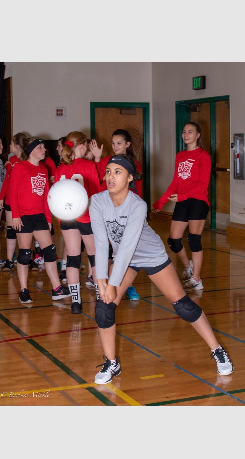 ASICS Upcourt 3 GS volleyball shoes in action during youth volleyball practice