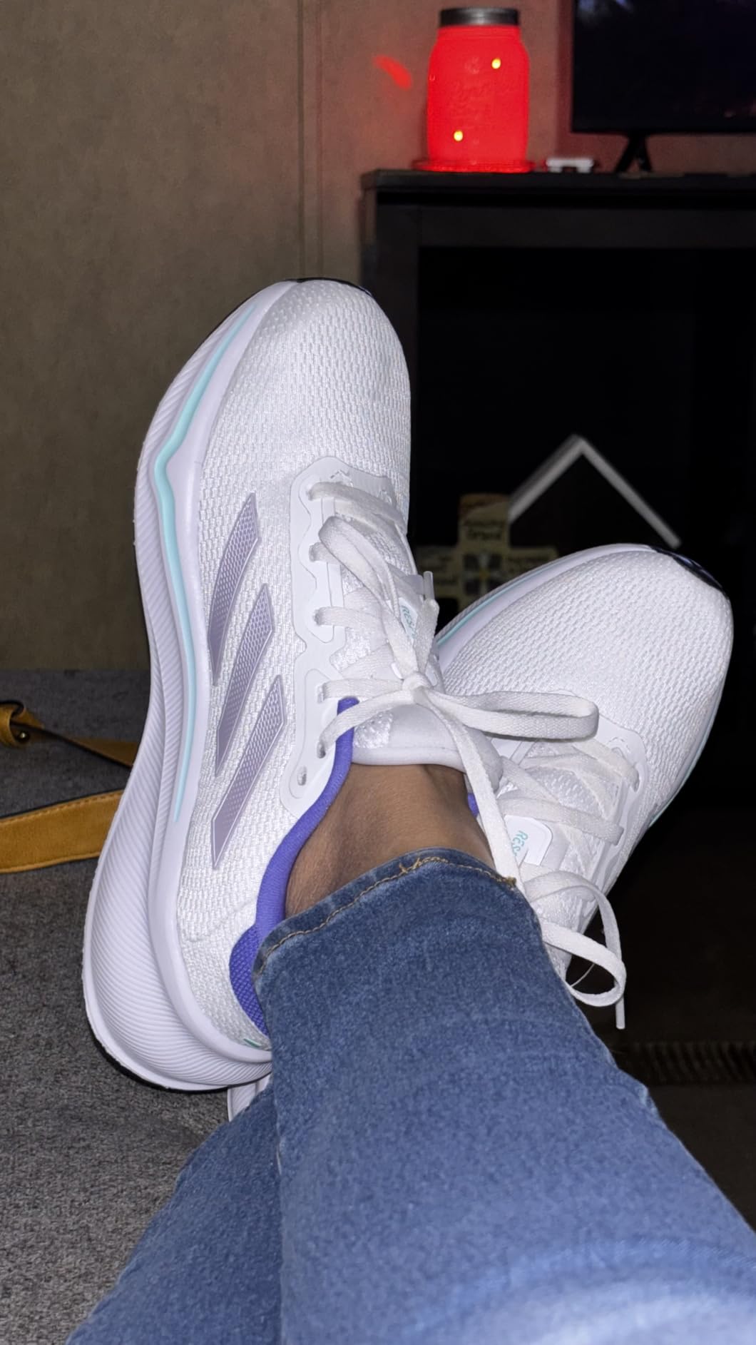 Adidas Response running shoe lifestyle wear showing cushioned sole and supportive design