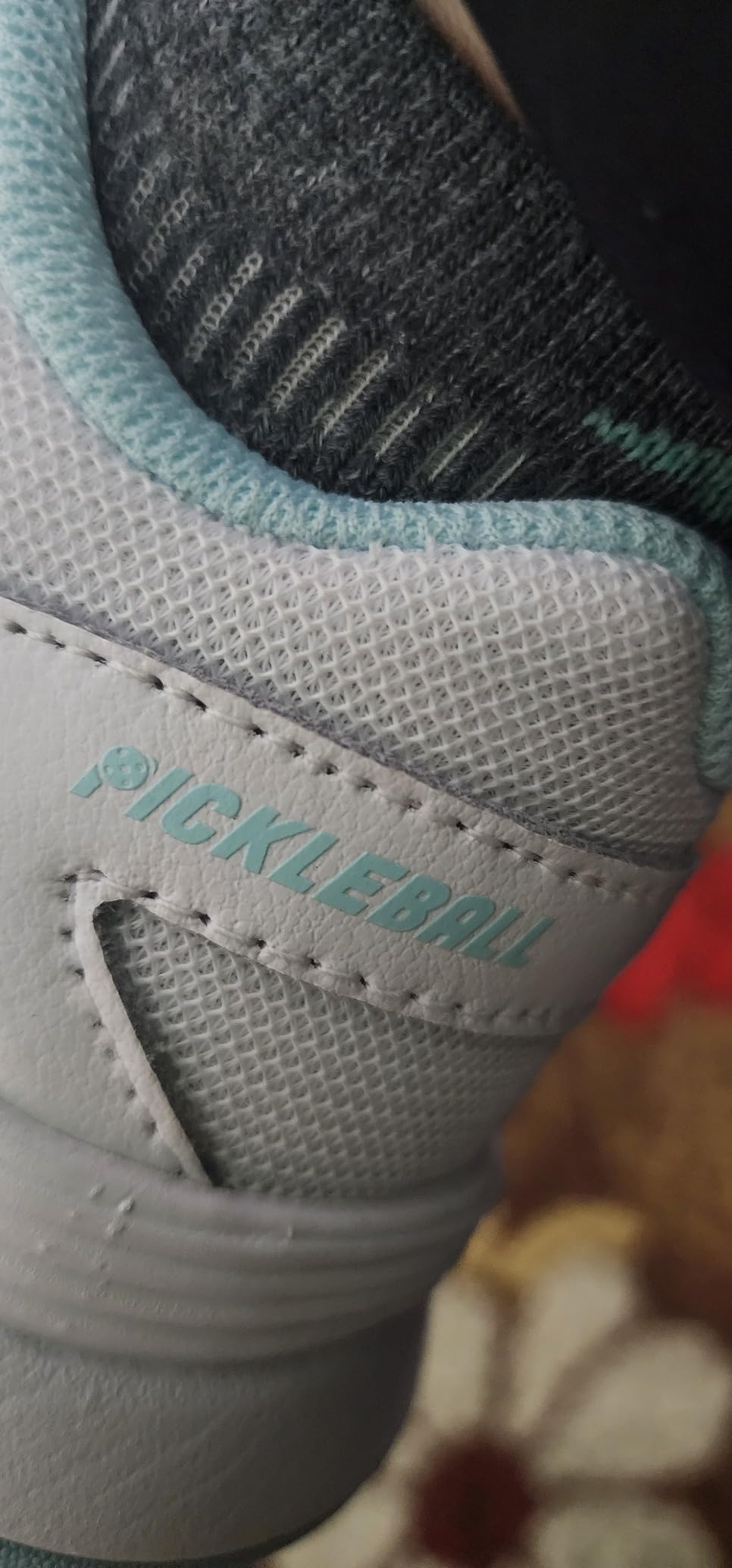 K-Swiss Court Express showing leather upper construction and side support details