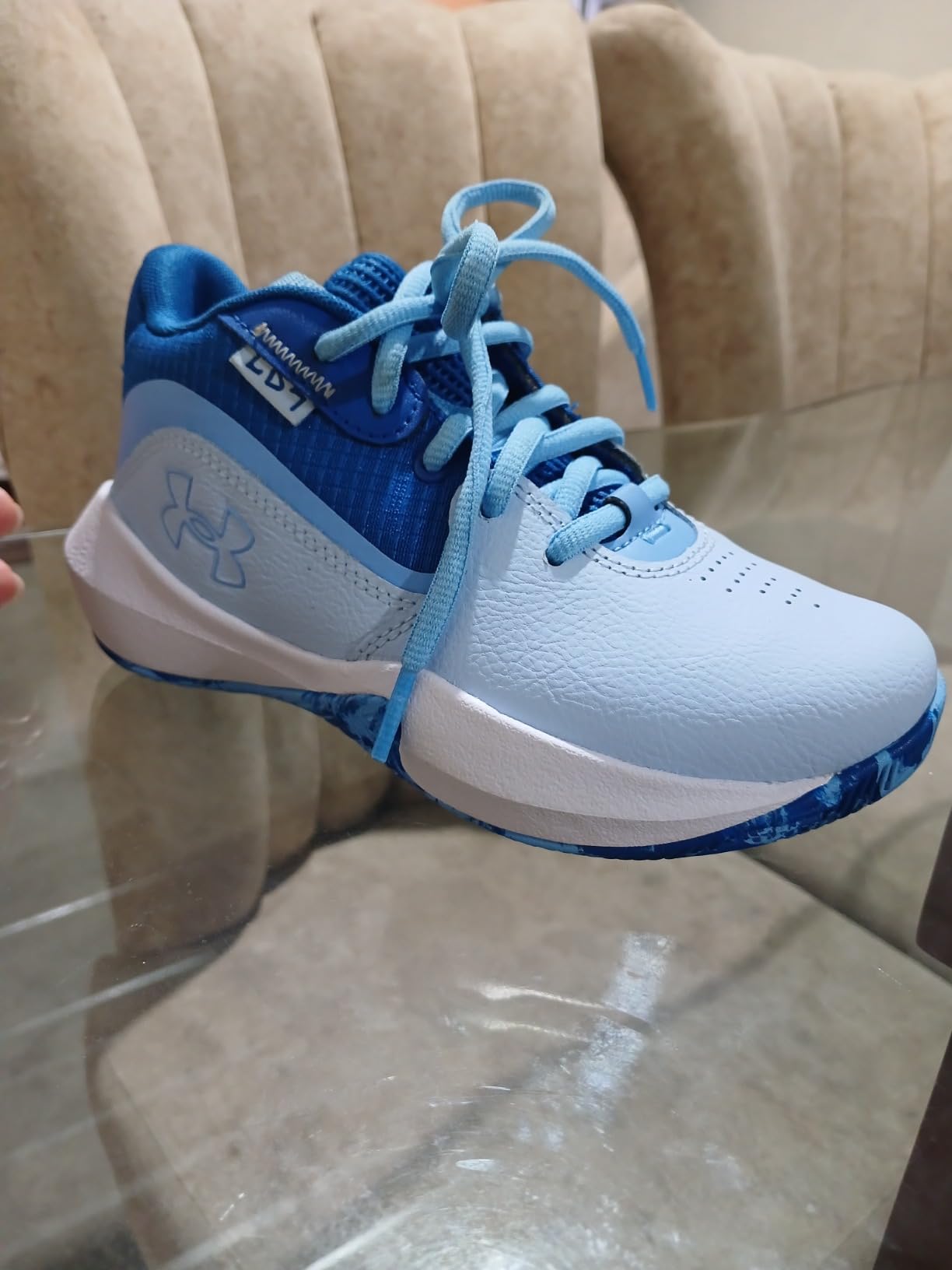 Under Armour Lockdown 7 basketball shoes showing rubber outsole pattern for court traction