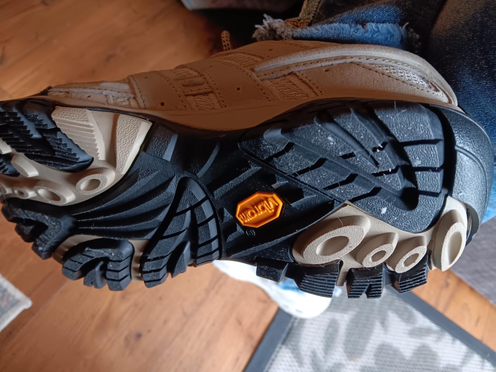 Close-up of Merrell Moab 2 Vent showing mesh ventilation panels and suede leather construction