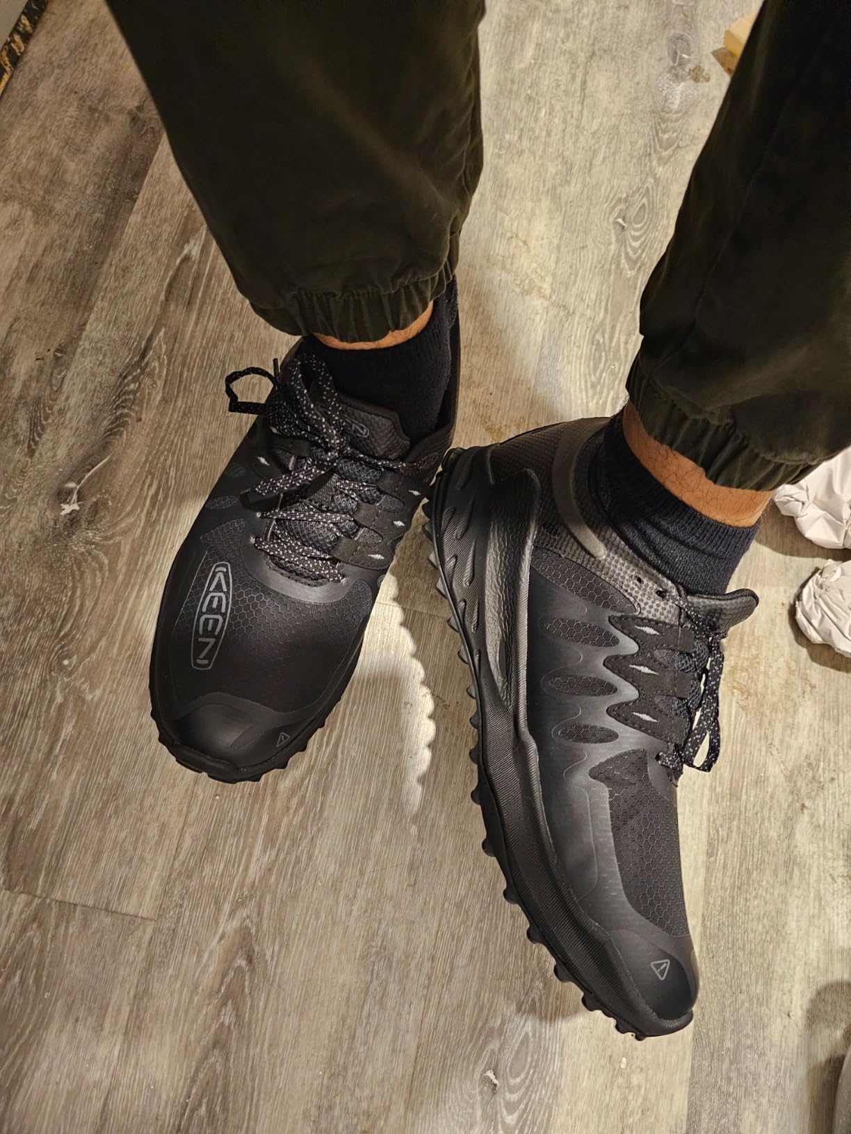 KEEN Zionic hiking shoe construction detail showing mesh upper and rubber overlays with waterproof membrane