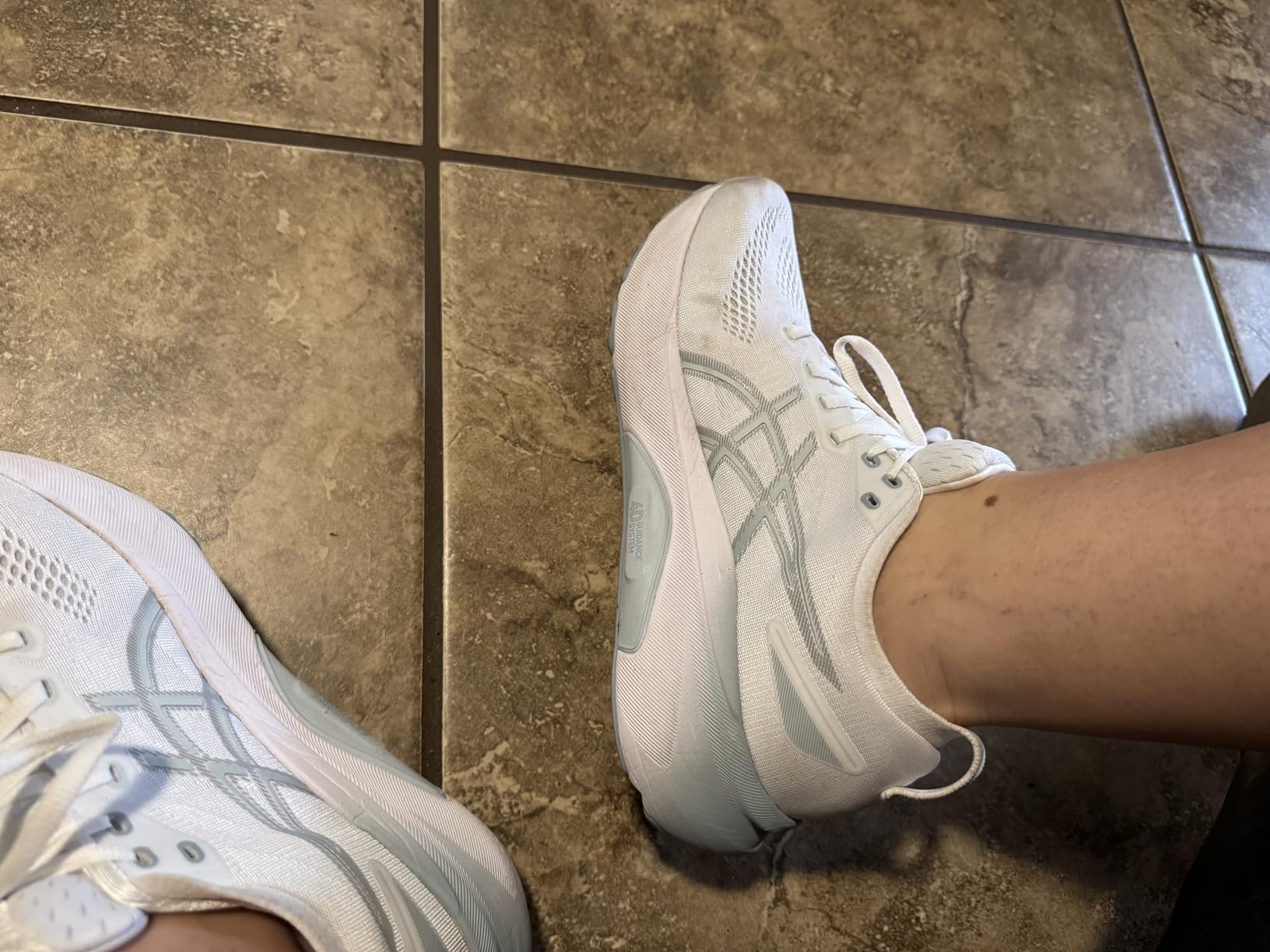 ASICS Women's Gel-Kayano 31 running shoes black bold magenta colorway showing engineered mesh upper and stability features