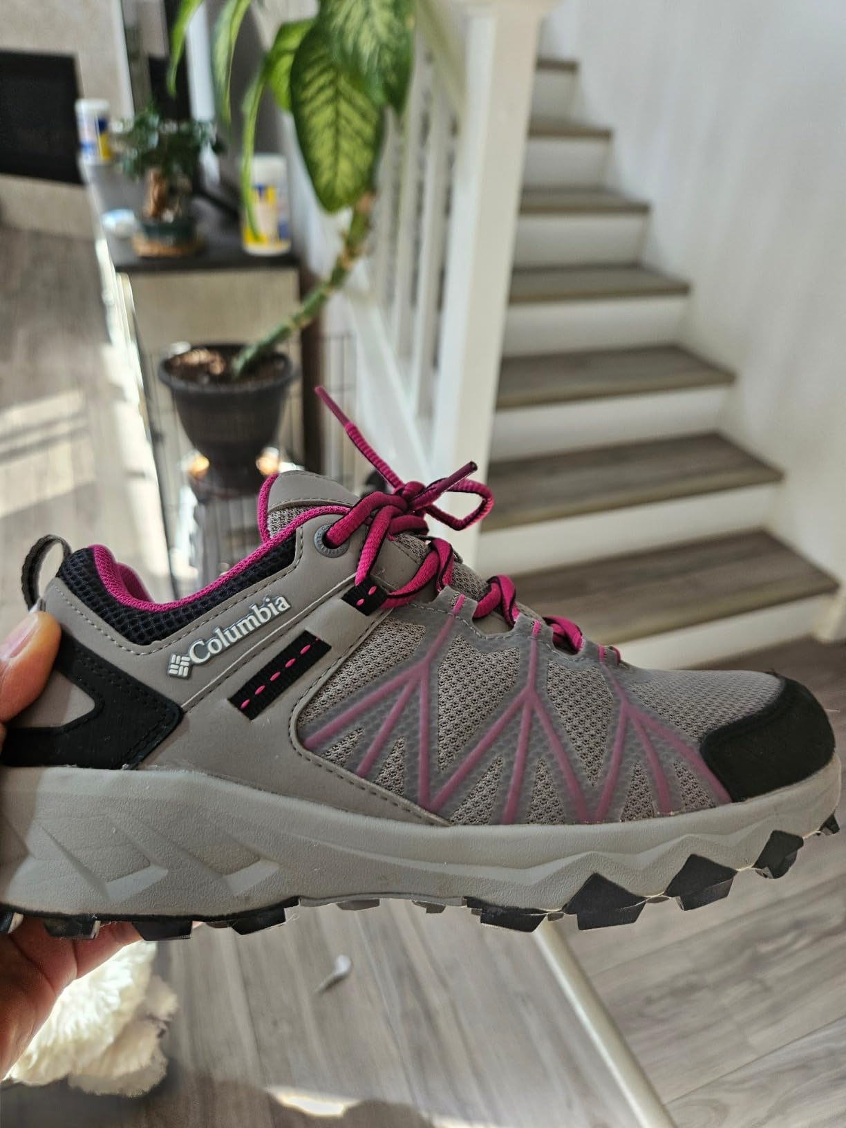 Columbia Peakfreak II Outdry in action on wet terrain showing waterproof performance