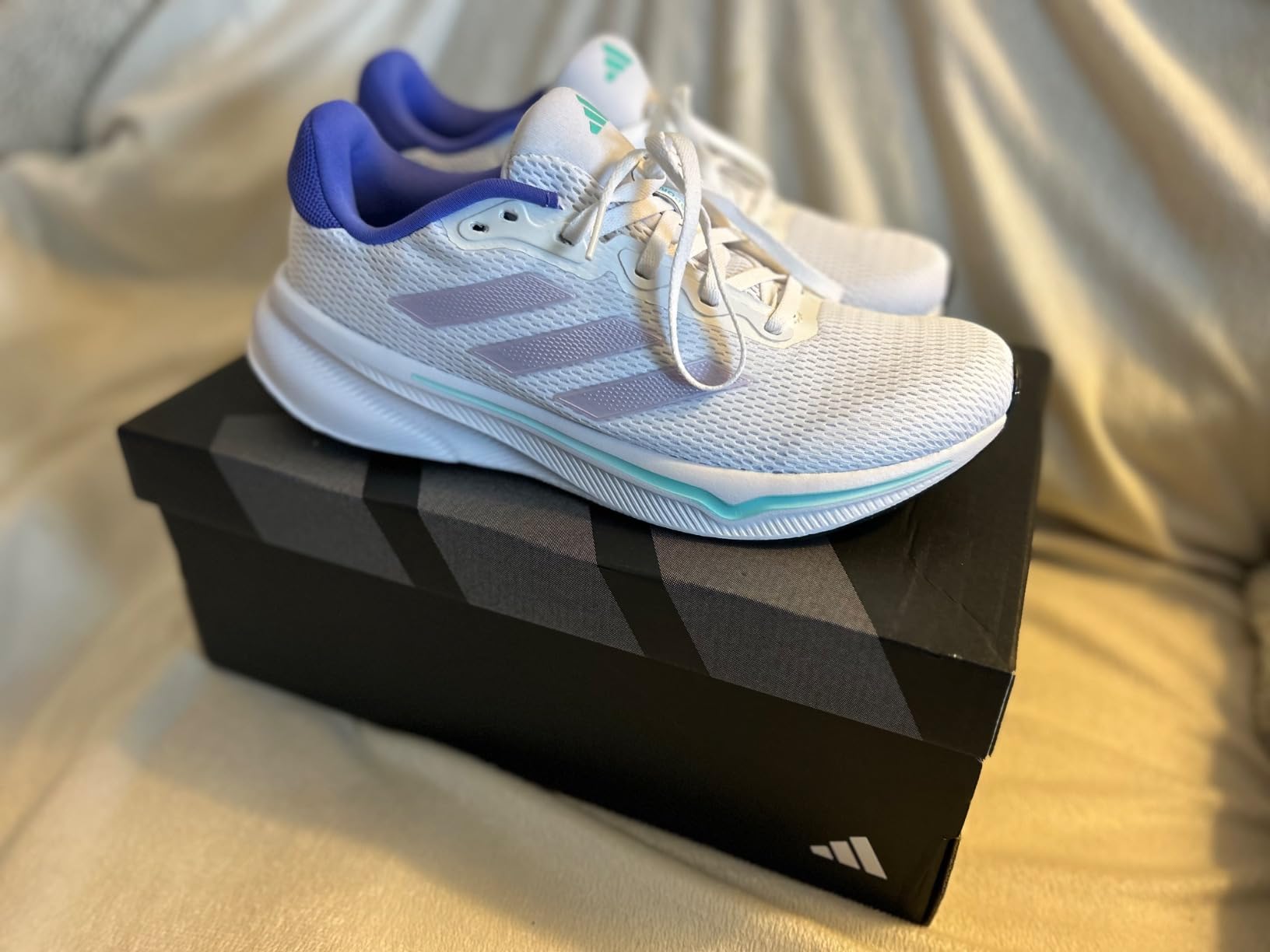 Adidas Response sneaker in natural lighting showing true color and everyday versatility