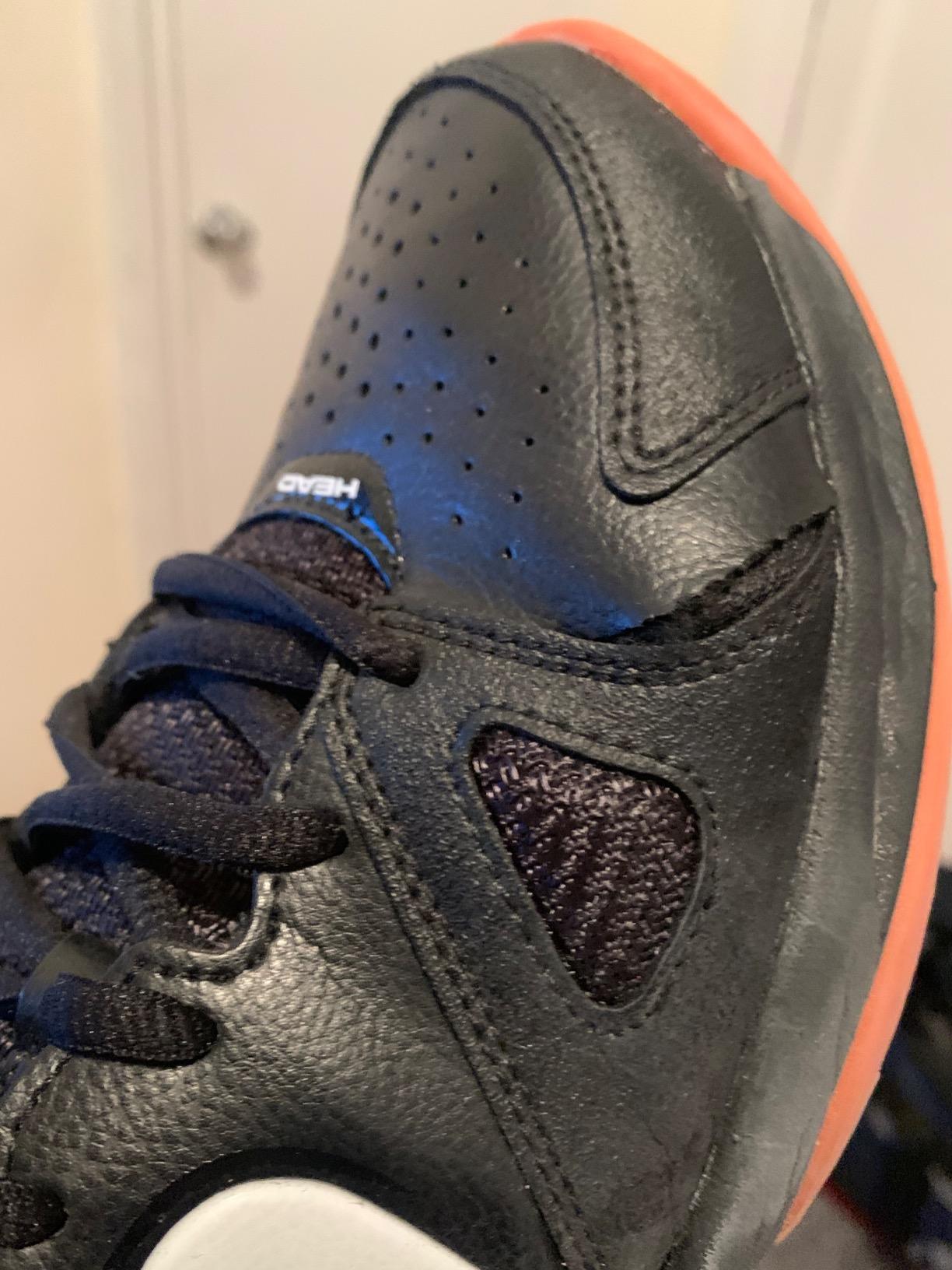 HEAD Grid 2.0 court shoe showing severe side separation and structural failure after regular use