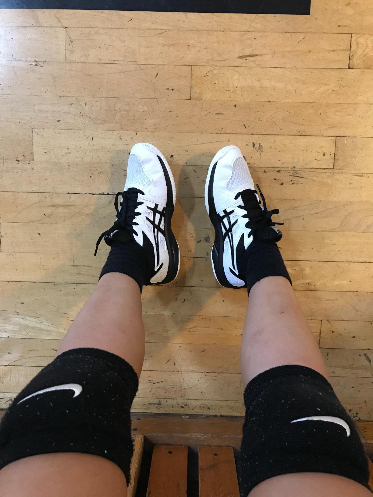 ASICS Upcourt 3 GS volleyball shoes showing side profile with supportive design elements