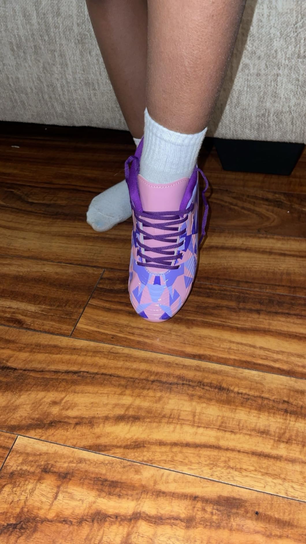 Bottom view of the MIFAWA Kids Soccer Cleats showing the TPR cleat pattern and rubber outsole