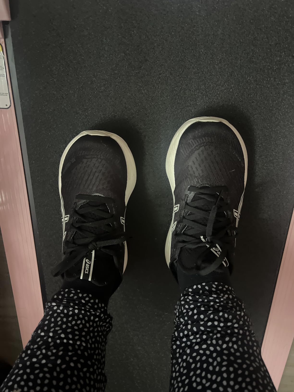 ASICS Gel-Nimbus 27 detail shot showing engineered mesh upper and PureGEL cushioning technology