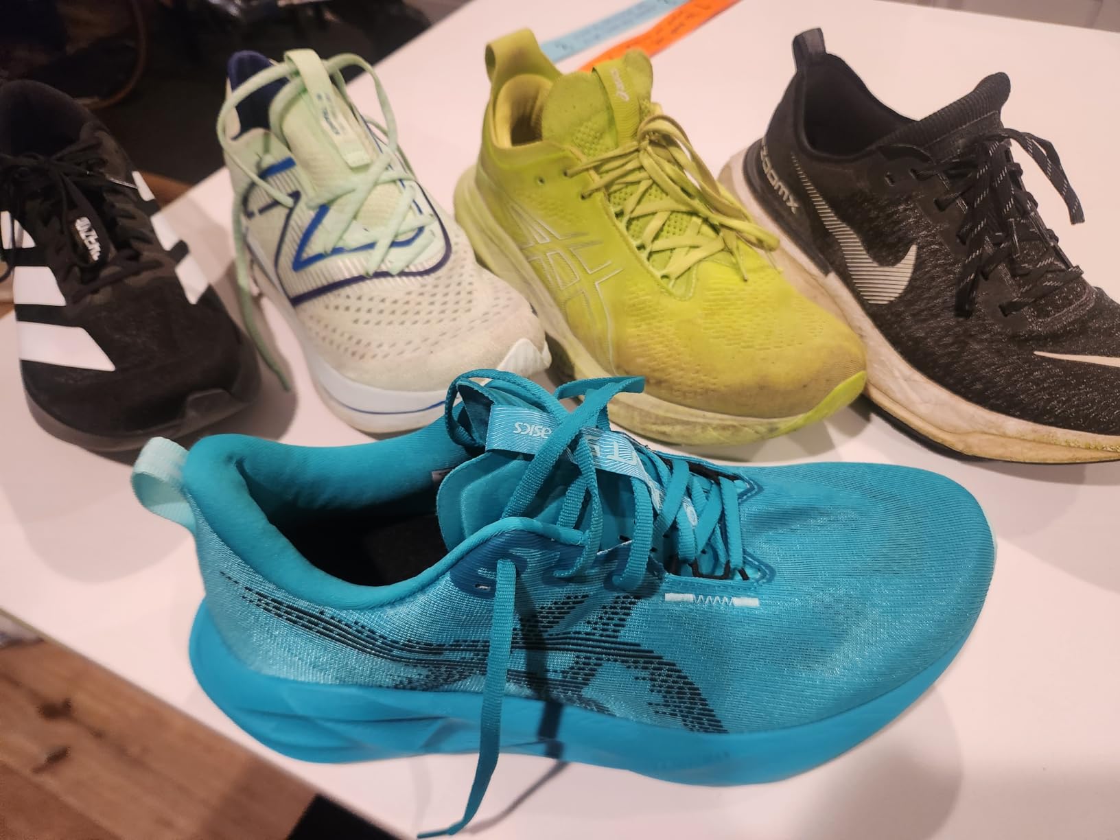 ASICS NOVABLAST 5 men's running shoes showing engineered mesh upper and FF BLAST MAX midsole