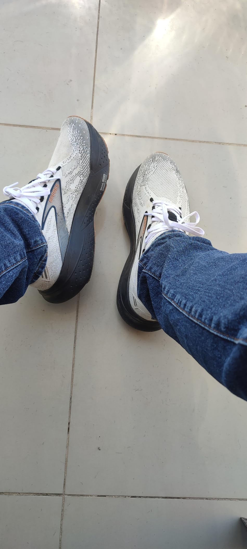 Brooks Glycerin StealthFit 21 side profile showing sock-like upper construction and DNA LOFT midsole