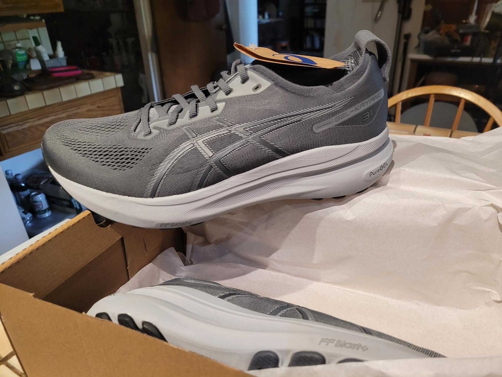 ASICS Gel-Kayano 31 design details showing 4D guidance system and engineered mesh construction