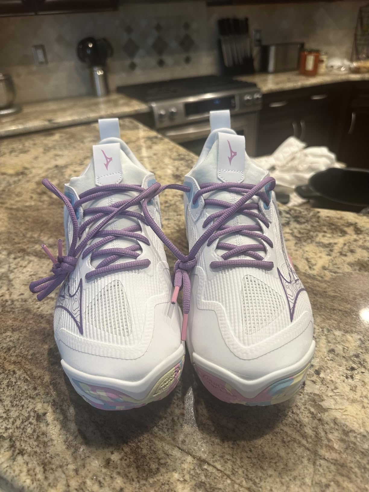 Side view of Mizuno Wave Momentum 3 showing Wave technology plate and ENERZY midsole