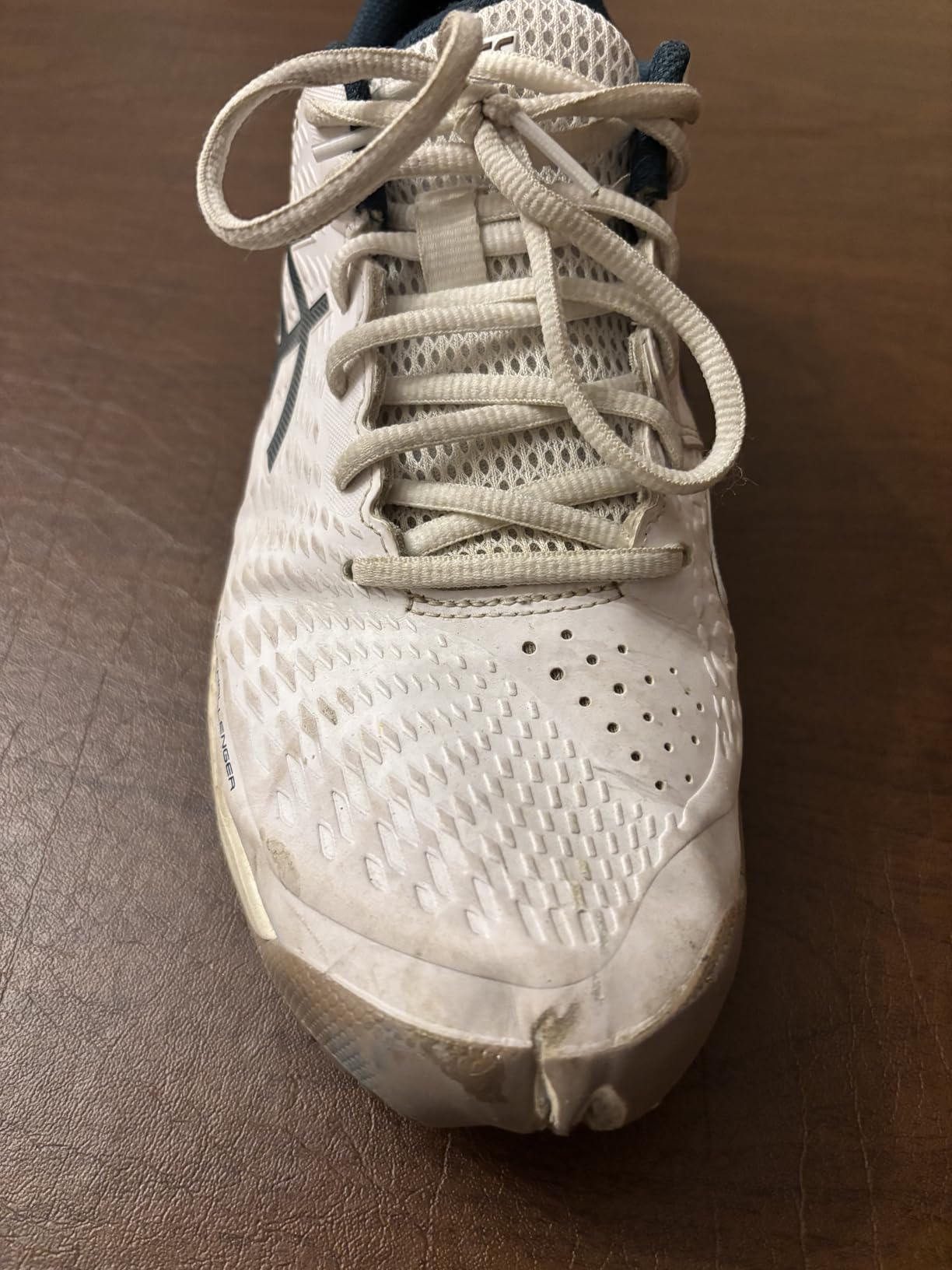 Asics Gel-Challenger 14 outsole showing AHARPLUS rubber compound and clay court traction pattern