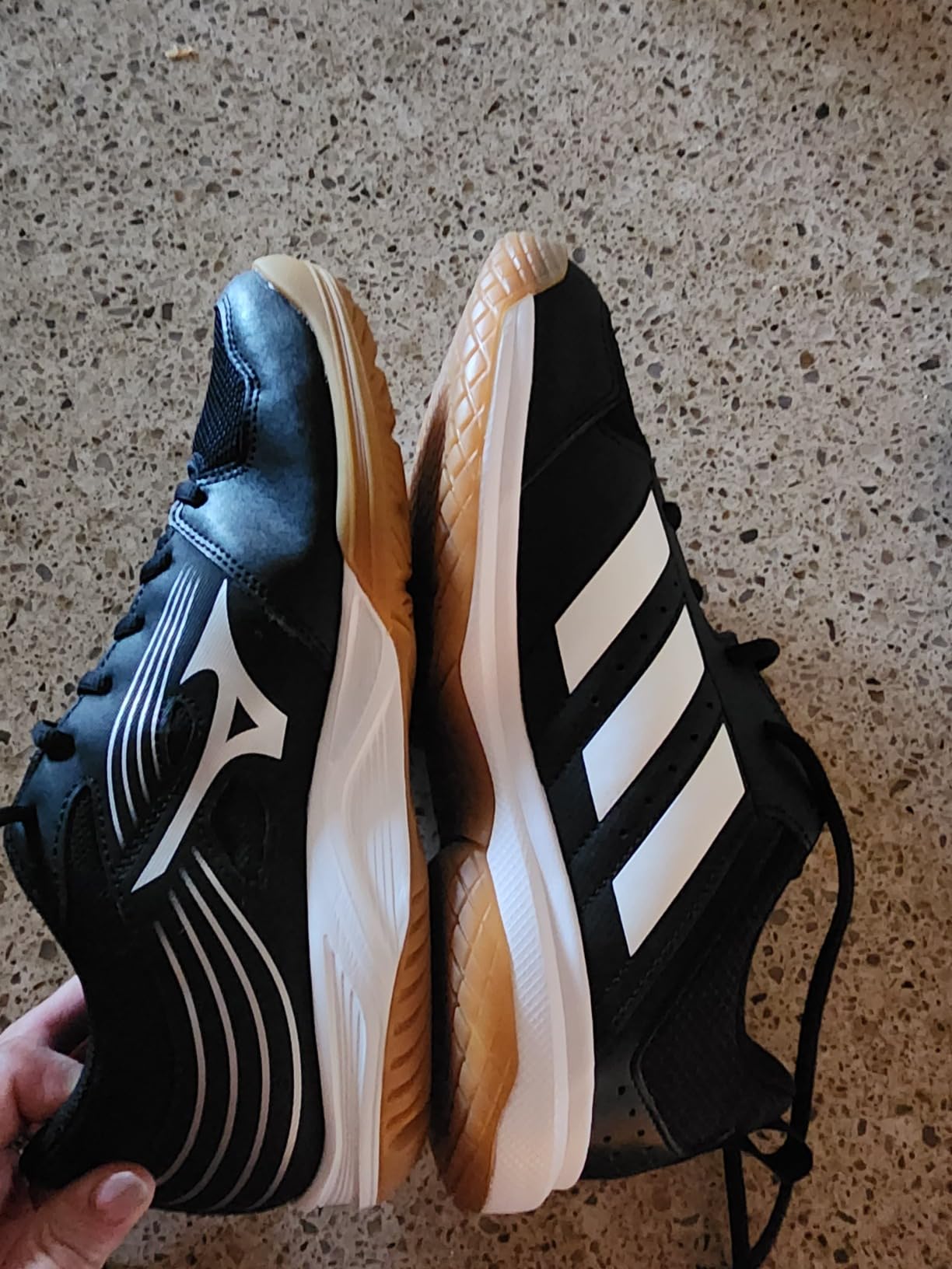 Close-up of Mizuno Cyclone Speed 3 construction showing synthetic overlay pattern and breathable mesh panels on the upper