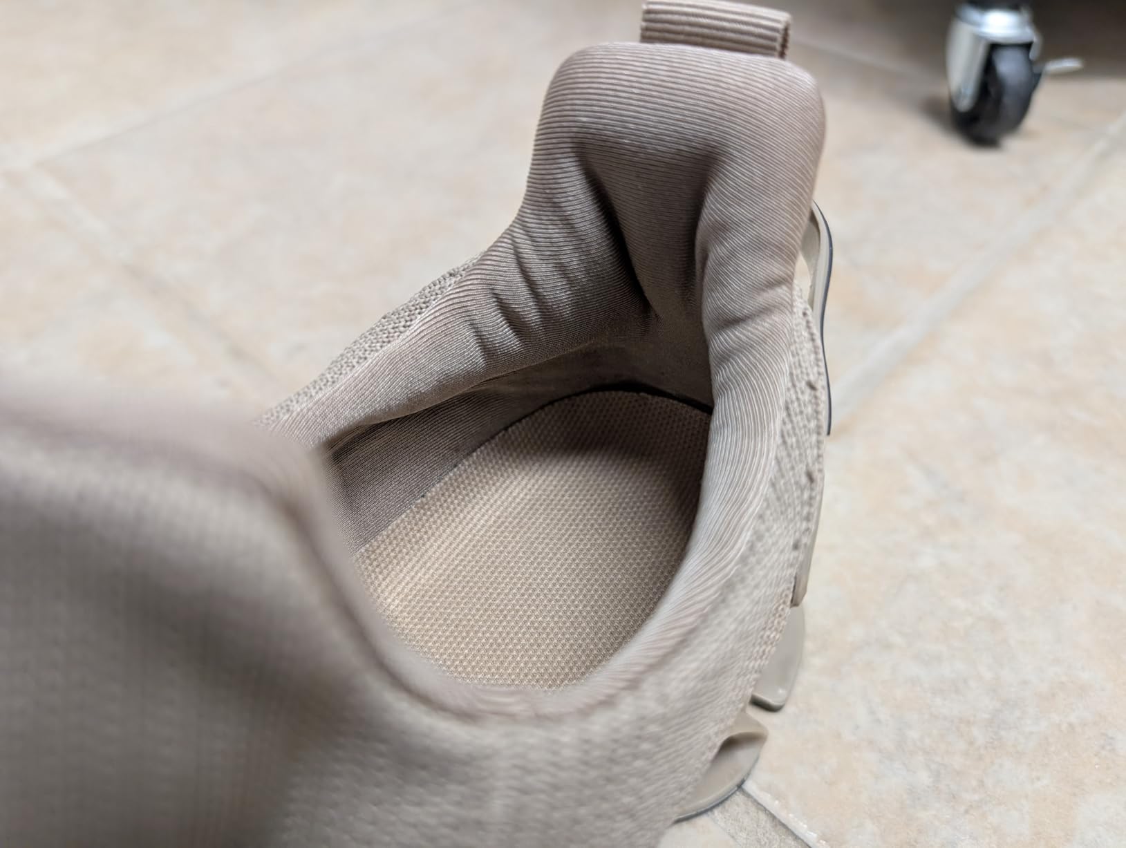 Side view showing blade sole flexibility and overall shoe profile during use