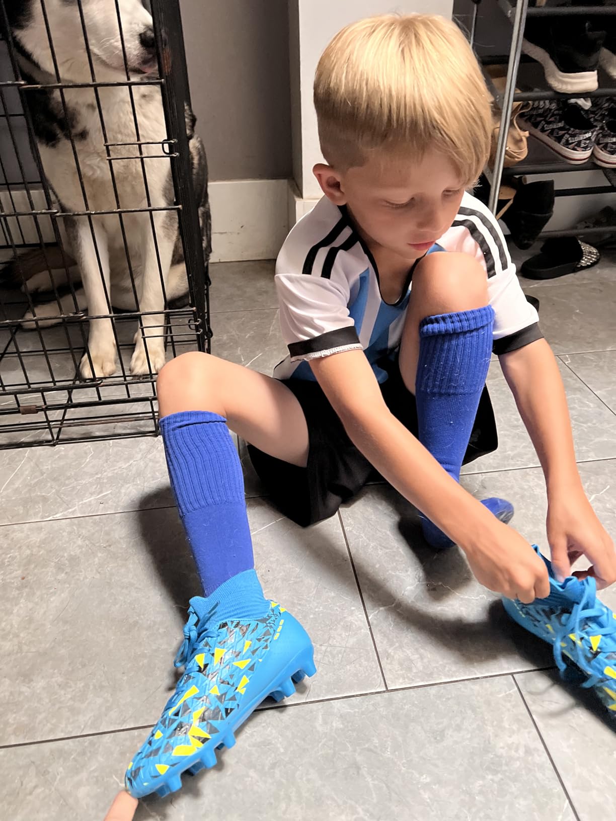 DREAM PAIRS boys soccer cleats in action during youth game showing ankle support